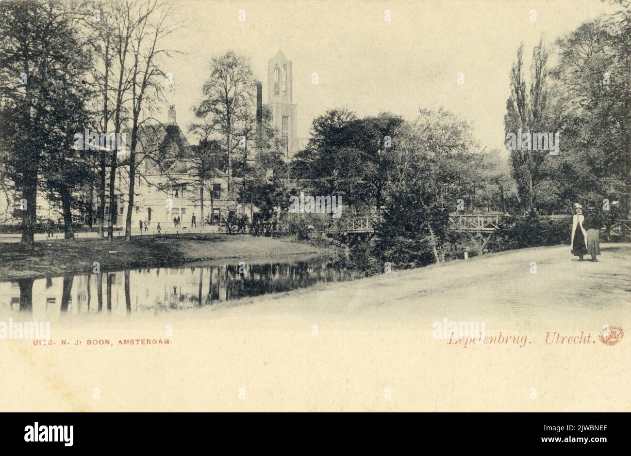 View of the Stadsbuitengracht in Utrecht with the Dom tower in the background and the bat bridge on the right. Stock Photo