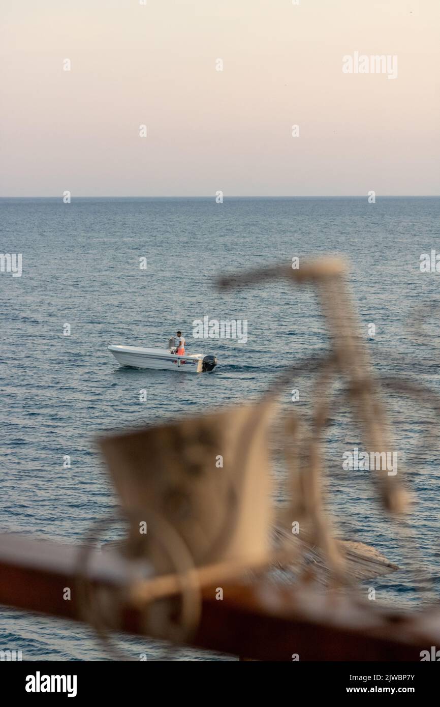 Man riding in a boat hi-res stock photography and images - Alamy