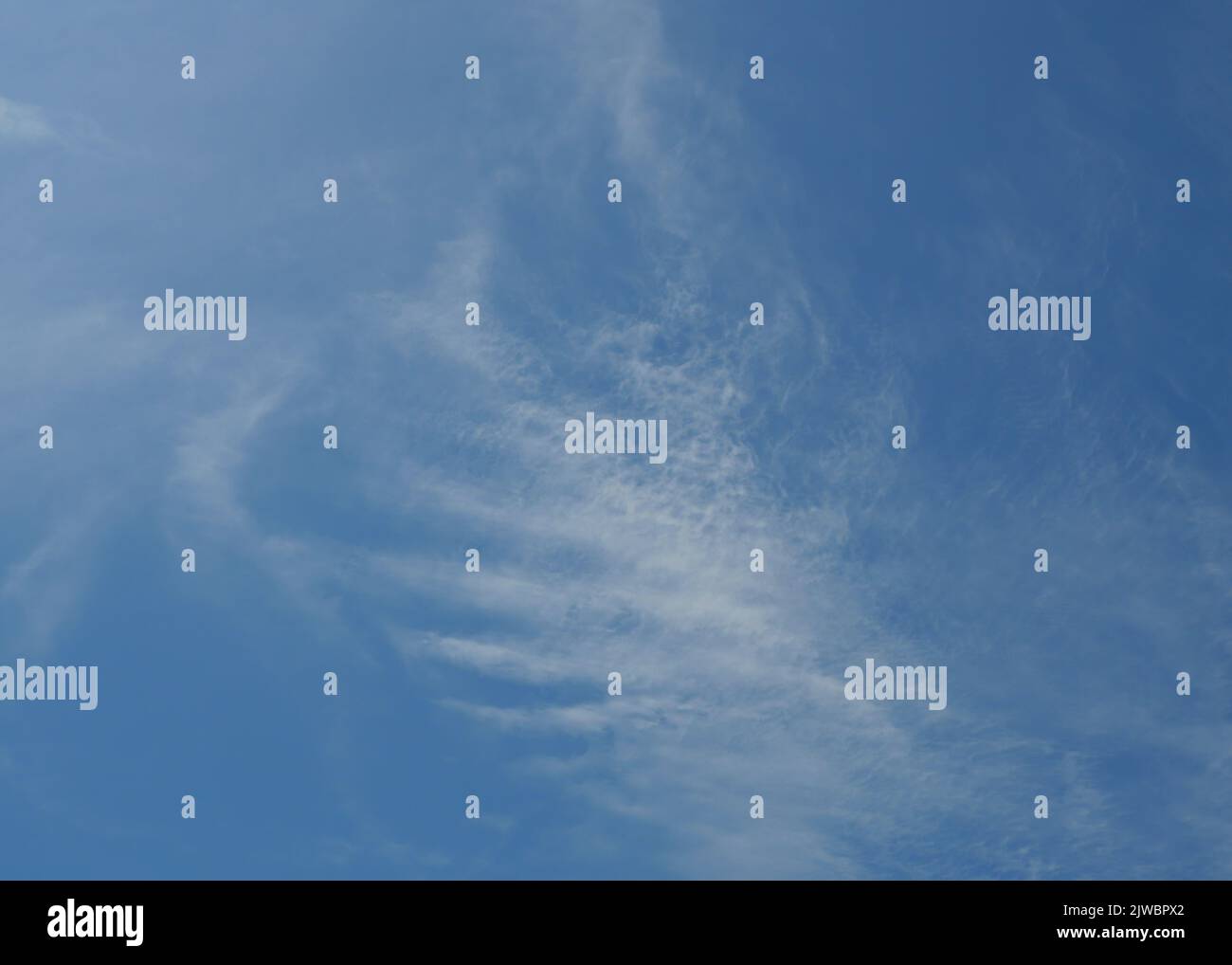 Altocumulus cloud on beautiful blue sky , Fluffy clouds formations at tropical zone Stock Photo