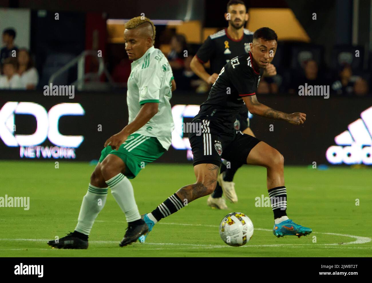 WASHINGTON, DC, USA - 4 SEPTEMBER 2022: D.C. United forward Martin Rodriguez (77) and Colorado Rapids forward Michael Barrios (12) challenge for the ball during a MLS match between D.C United and the Colorado Rapids, on September 04, 2022, at Audi Field, in Washington, DC. (Photo by Tony Quinn-Alamy Live News) Stock Photo