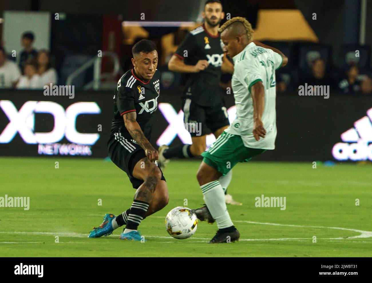 WASHINGTON, DC, USA - 4 SEPTEMBER 2022: D.C. United forward Martin Rodriguez (77) and Colorado Rapids forward Michael Barrios (12) challenge for the ball during a MLS match between D.C United and the Colorado Rapids, on September 04, 2022, at Audi Field, in Washington, DC. (Photo by Tony Quinn-Alamy Live News) Stock Photo