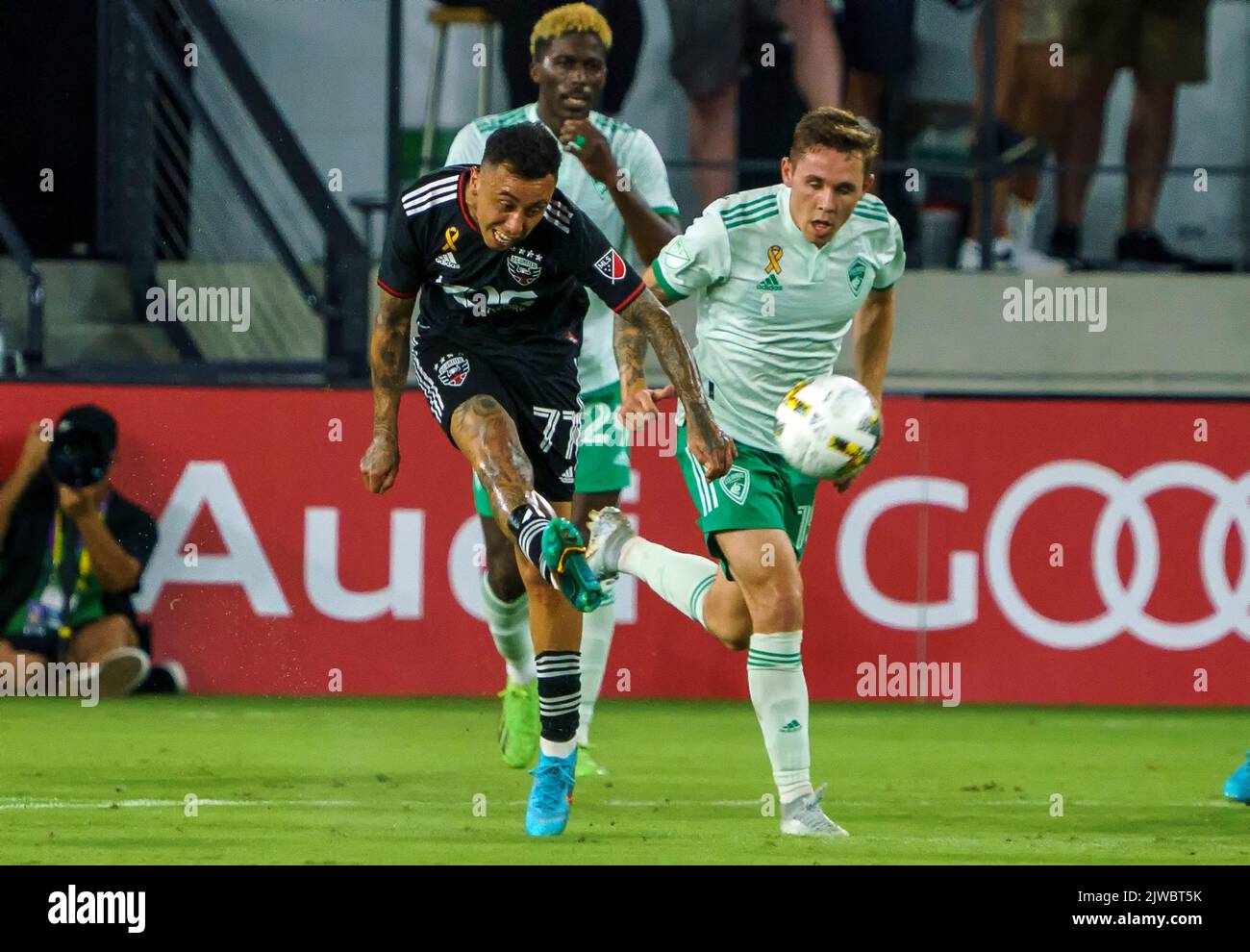 WASHINGTON, DC, USA - 4 SEPTEMBER 2022: D.C. United forward Martin Rodriguez (77) boots the ball away from Colorado Rapids midfielder Philip Mayaka (16) during a MLS match between D.C United and the Colorado Rapids, on September 04, 2022, at Audi Field, in Washington, DC. (Photo by Tony Quinn-Alamy Live News) Stock Photo