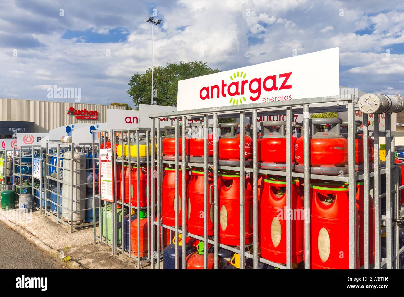 French 'Antargaz' propane and butane gas cylinders in secure storage racks - Ligueil, Indre-et-Loire (37), France. Stock Photo