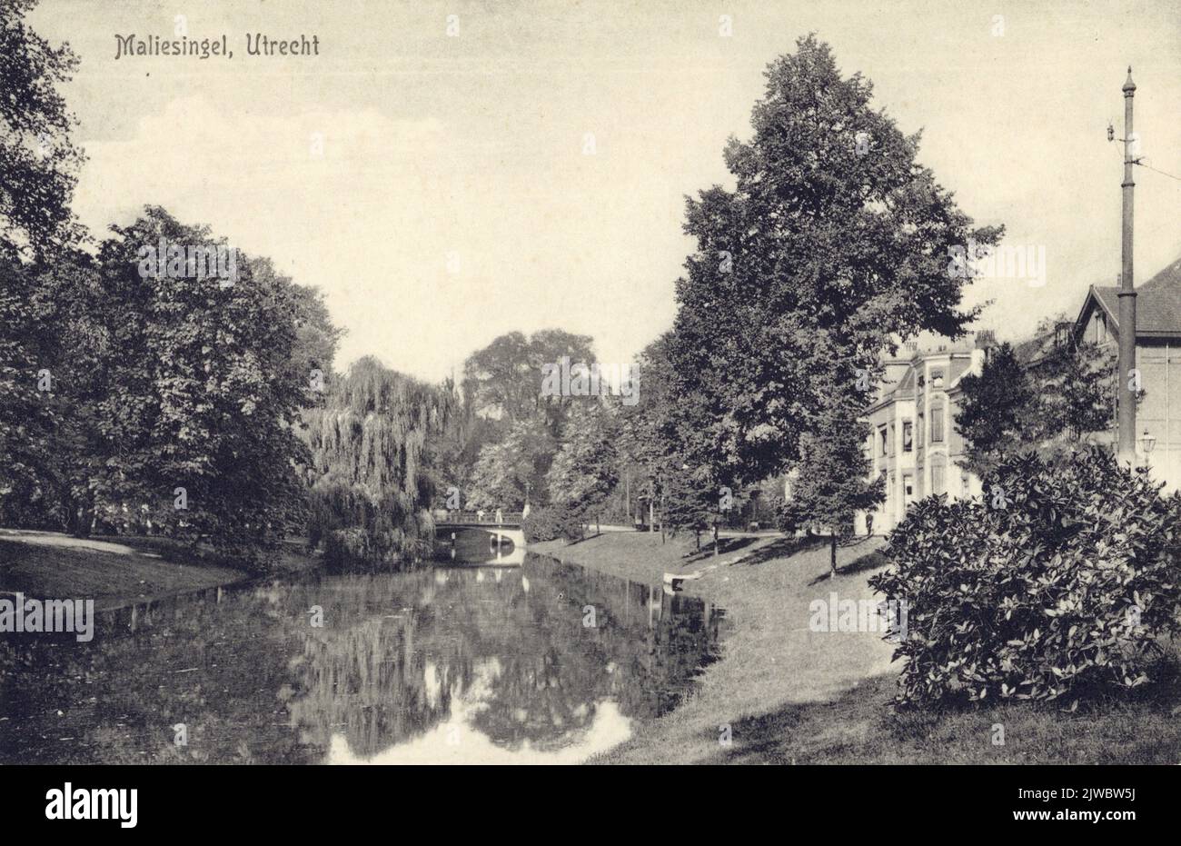 View of the Stadsbuitengracht in Utrecht from the southeast with a part of the houses on the Maliesingel on the right and in the background the Herenbrug. Stock Photo