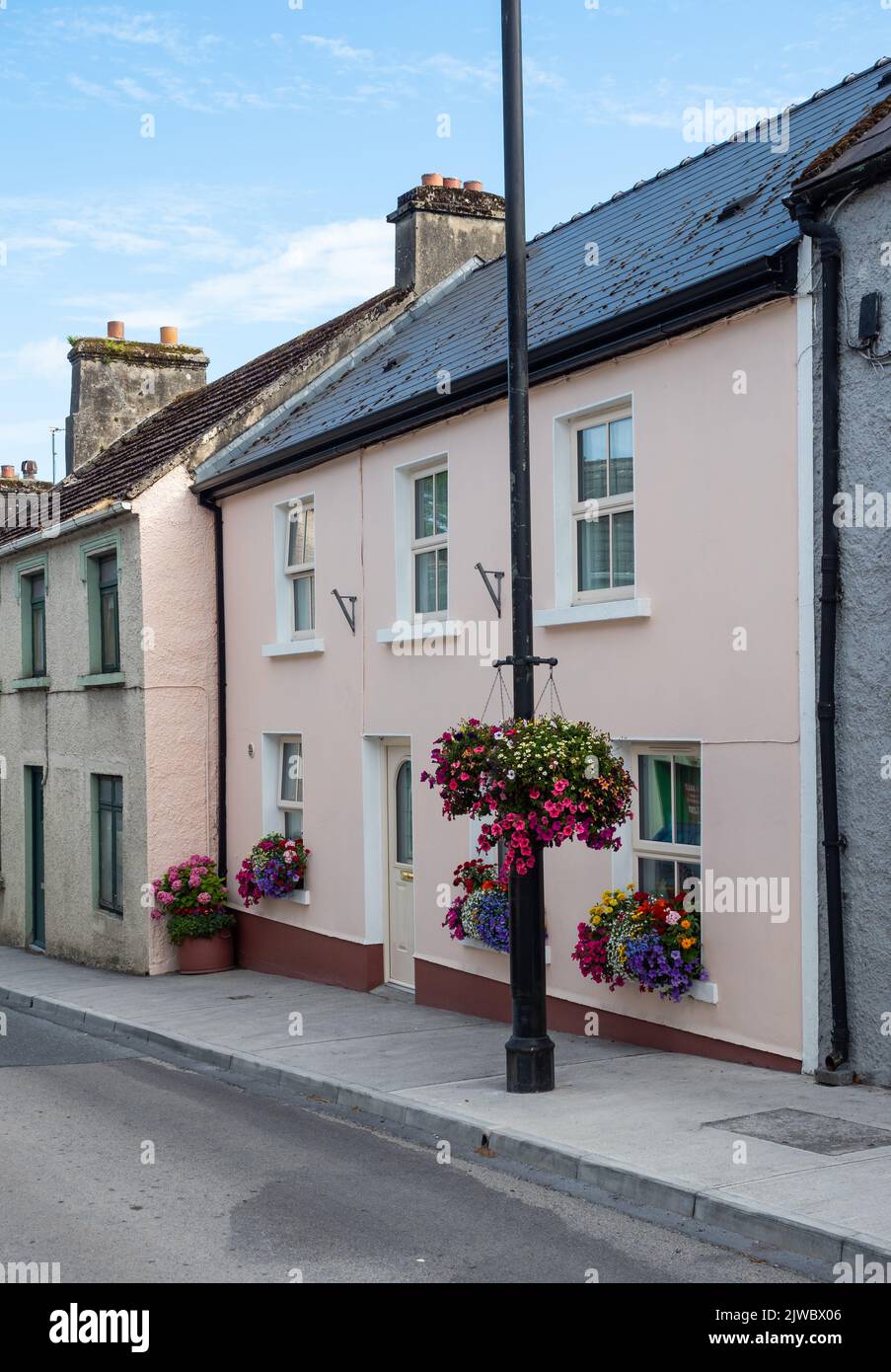 Traditional houses along Main Street in Cong, on the border of County Galway and County Mayo in Ireland. Stock Photo
