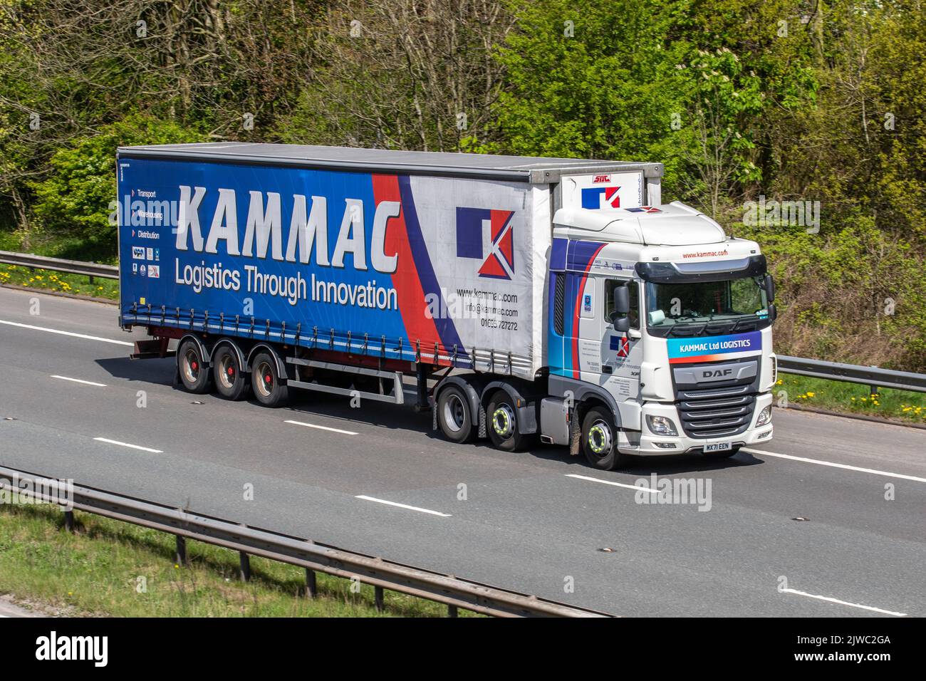 KAMMAC Ltd 'Logistics Through Innovation' Haulage vehicles.  DAF HGV Travelling on the M6 motorway UK Stock Photo