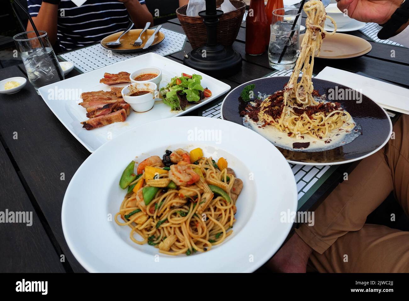 Close up seafood spaghetti in garlic and chili sauce Stock Photo