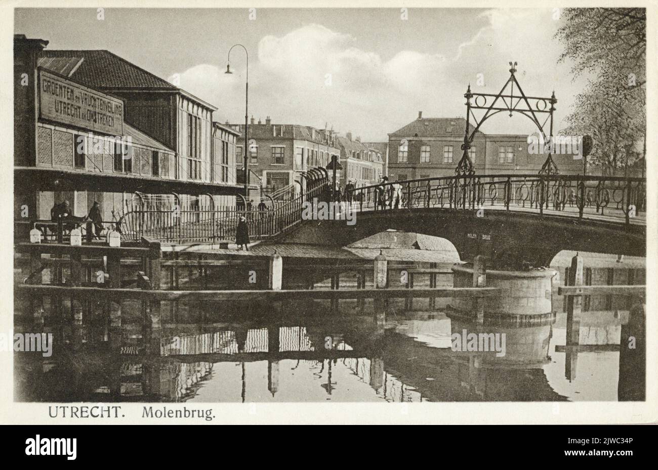 View of the Molenbrug over the Stadsbuitengracht in Utrecht; On the left the building for vegetable and fruit auctions (Catharijnekade 18). Stock Photo