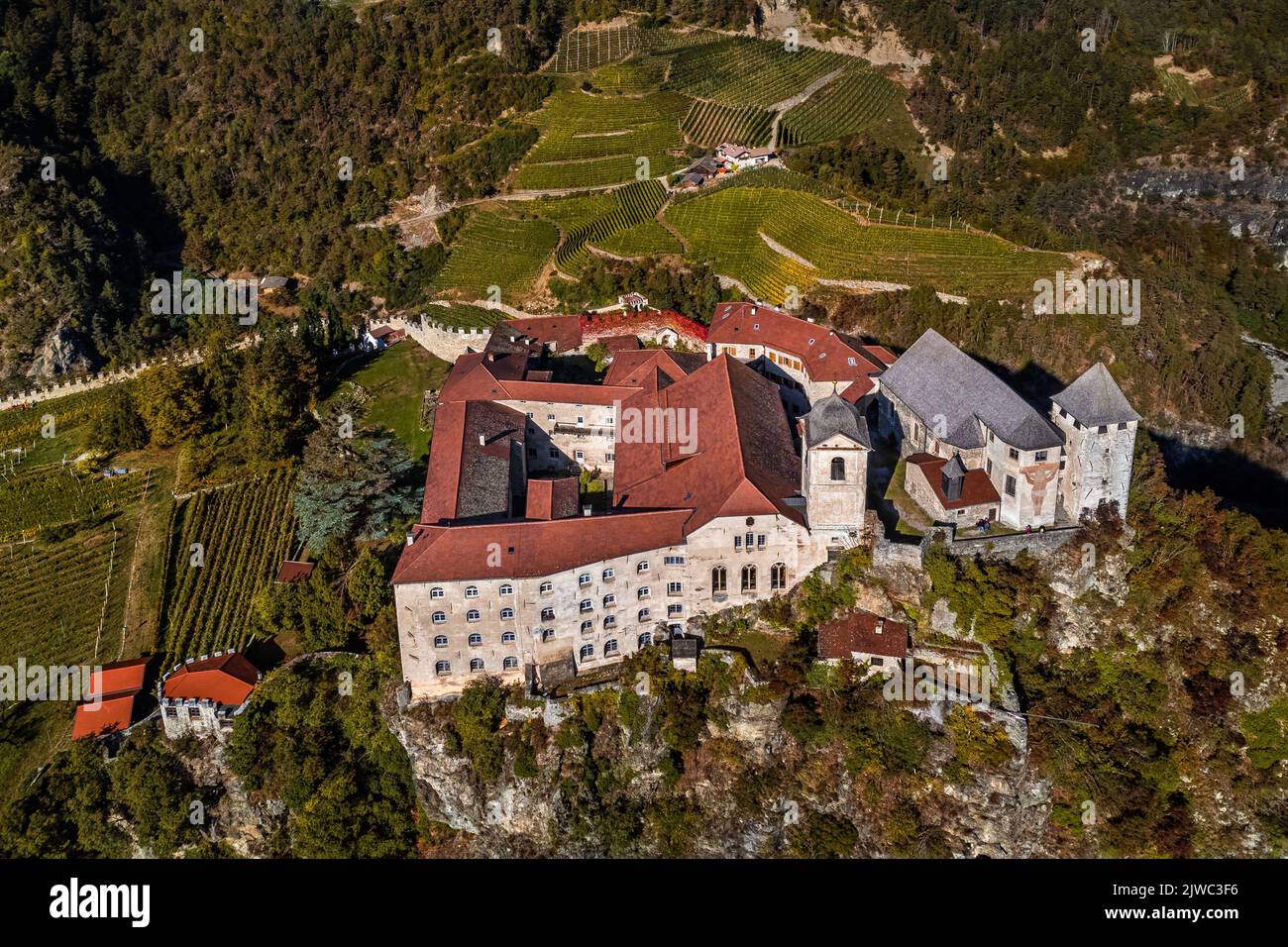 Klausen, Italy - Aerial view of the Saben Abbey (Monastero di Sabiona) by Chiusa (Klausen) comune northeast of the city of Bolzano on a sunny autumn d Stock Photo
