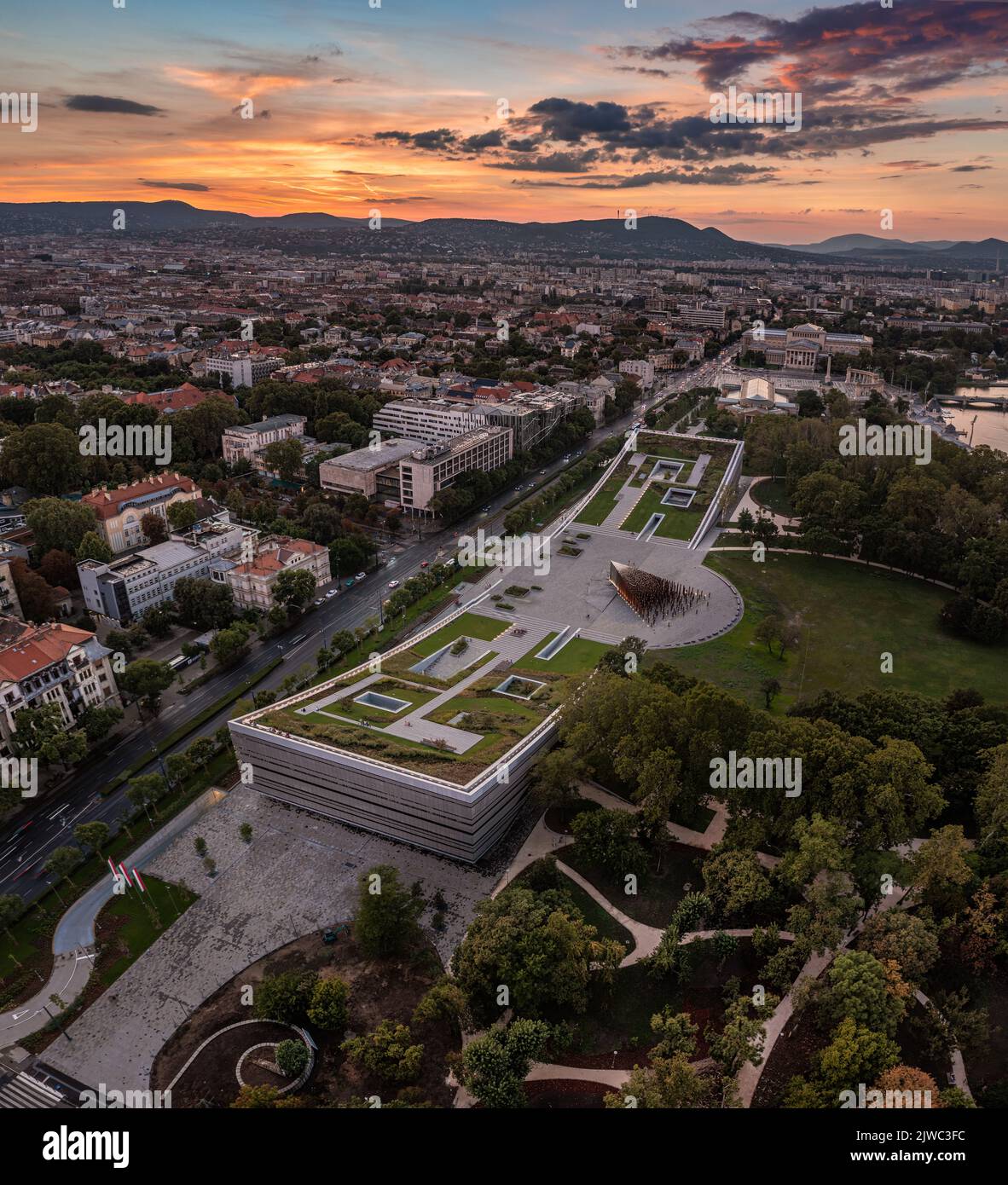 Budapest, Hungary - Aerial panoramic view of the Museum of Ethnography at City Park with Heroes' Square and skyline of Budapest at background with col Stock Photo