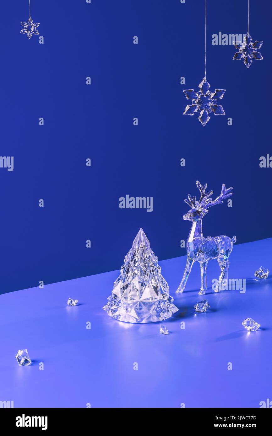 Winter scene with Christmas decorations on purple blue background Stock Photo