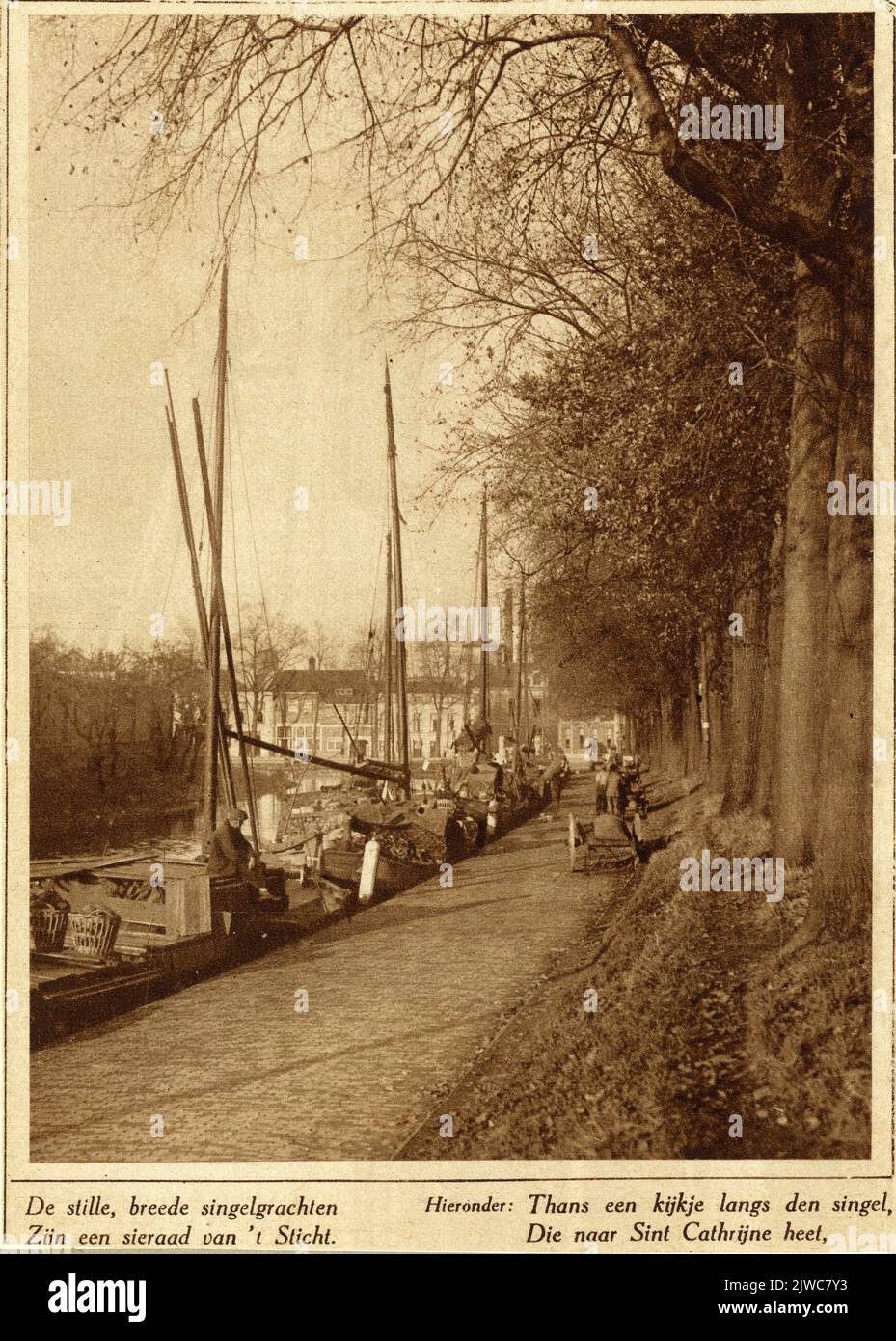 View of the Turfkade along the Wittevrouwensingel in Utrecht with the Stadsbuitengracht on the left and a few boats with peat. Stock Photo