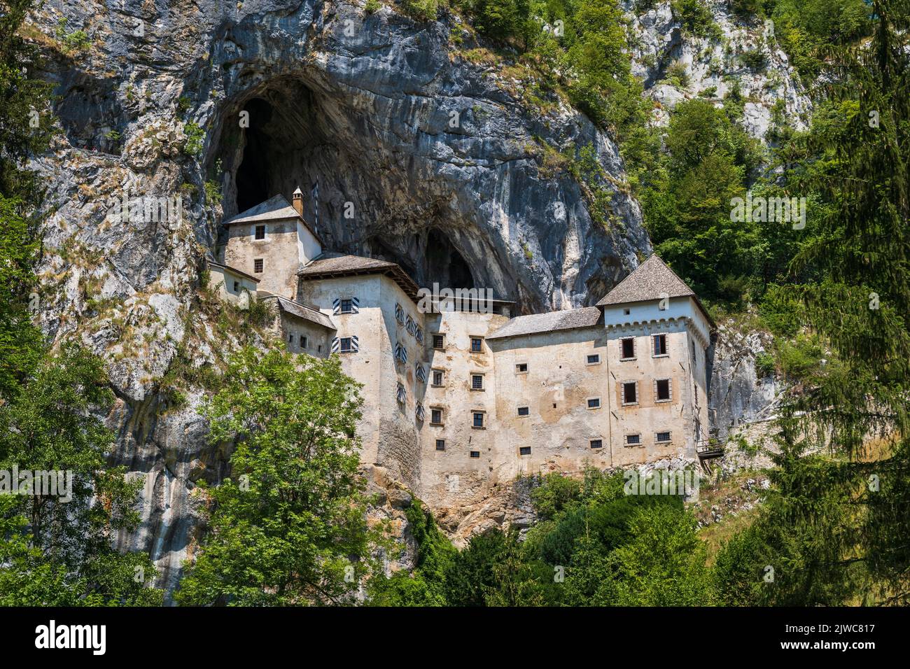 The Predjama Castle in Slovenia. Medieval cave castle perched in cliff. Stock Photo