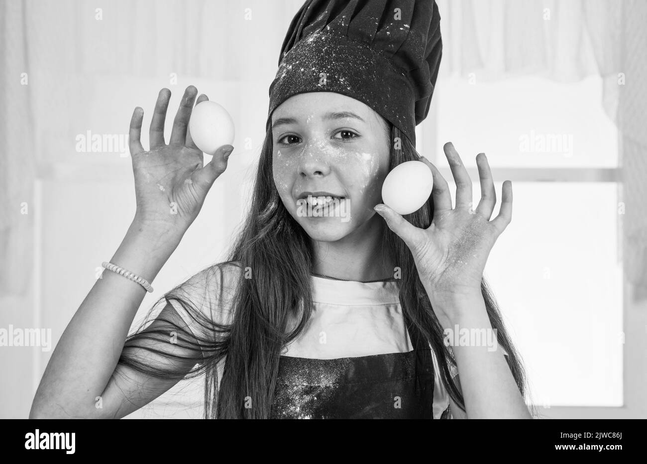So tasty. teen girl chef wearing uniform. child study how to cook by ...