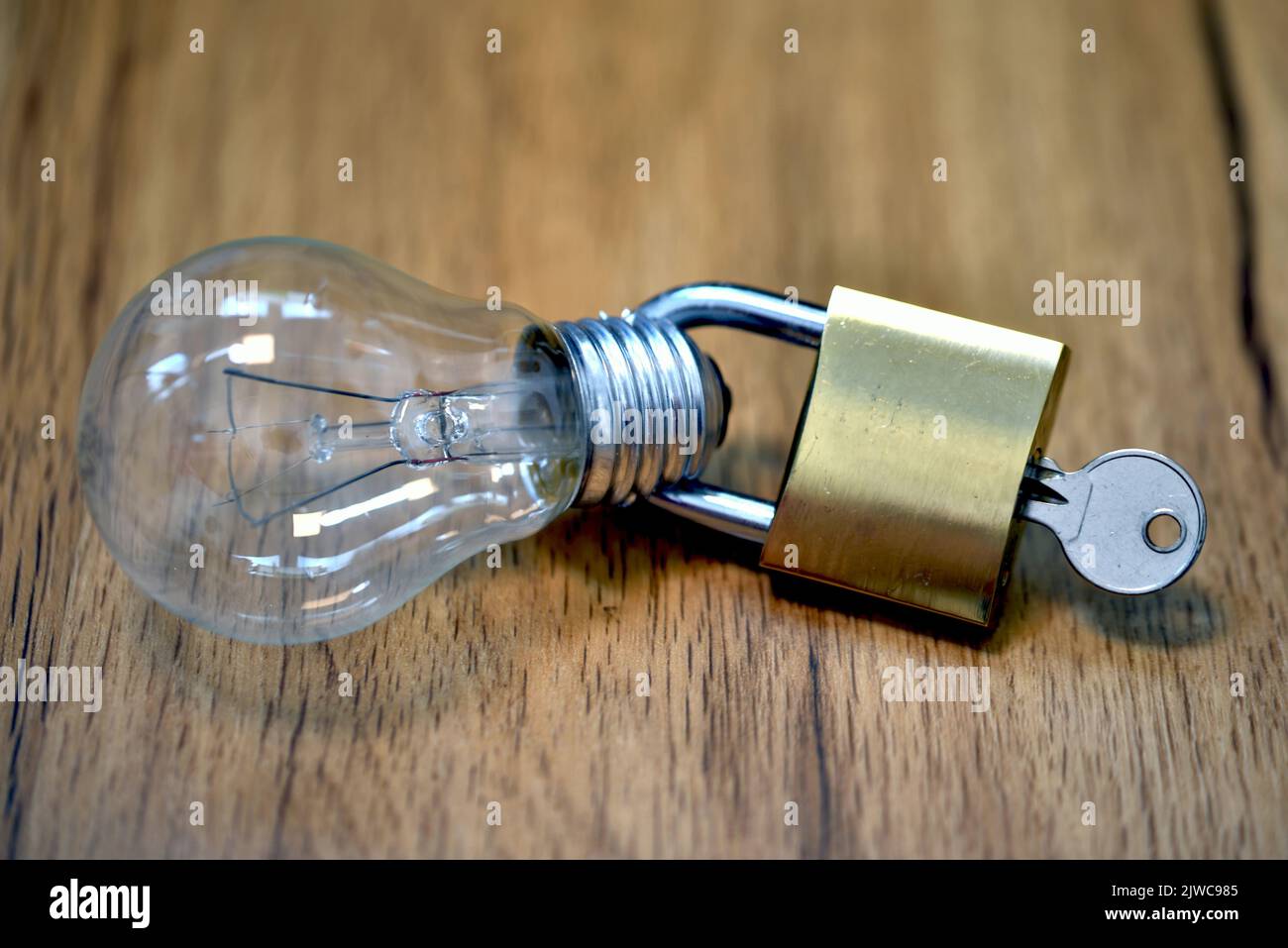lightbulb with padlock Stock Photo