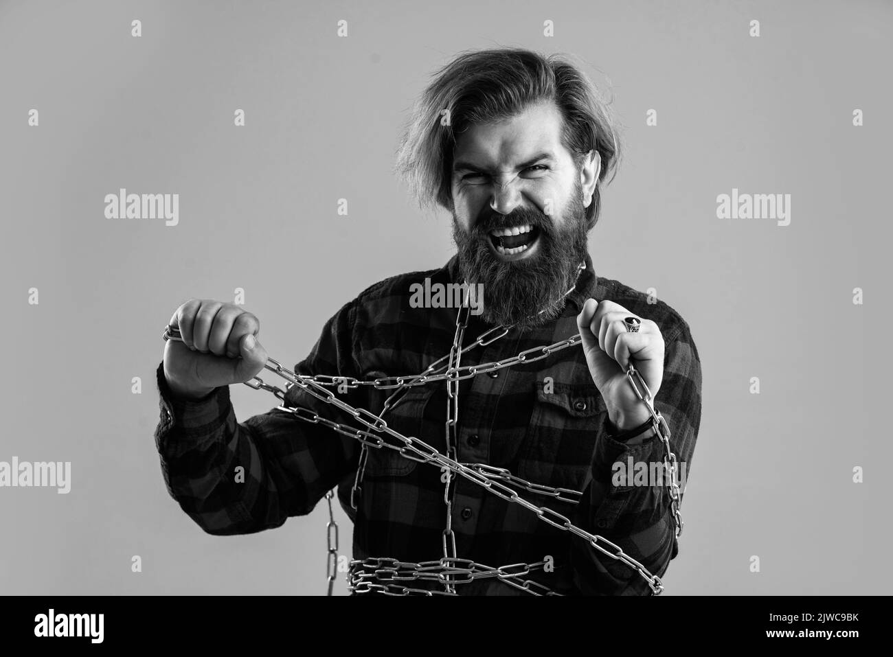 Suffering man chained feel cramps and muscle spasms, almost free Stock Photo