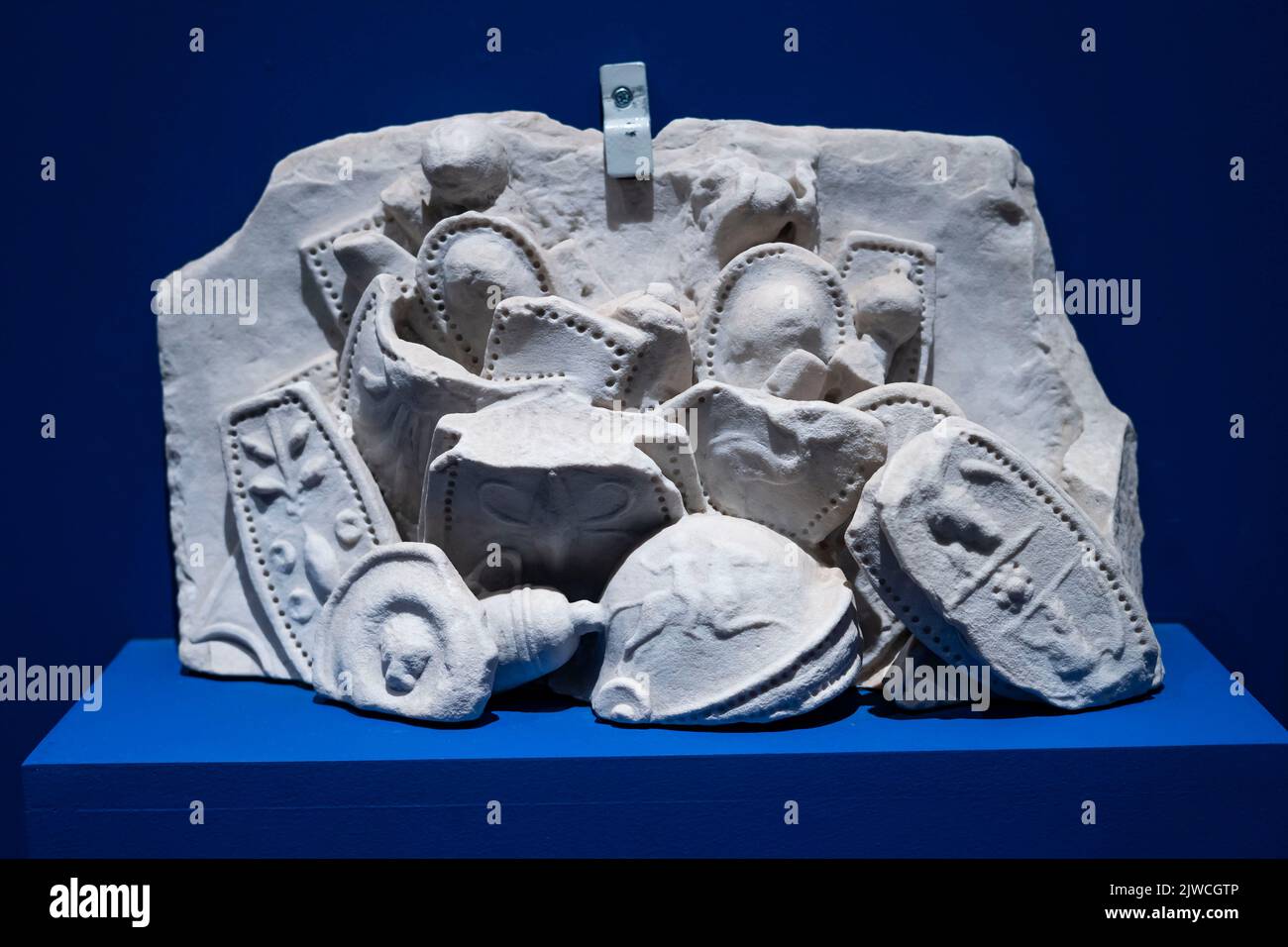 Rome, Italy - Capitoline Museums, Fragment of frieze with heap of weapons Stock Photo