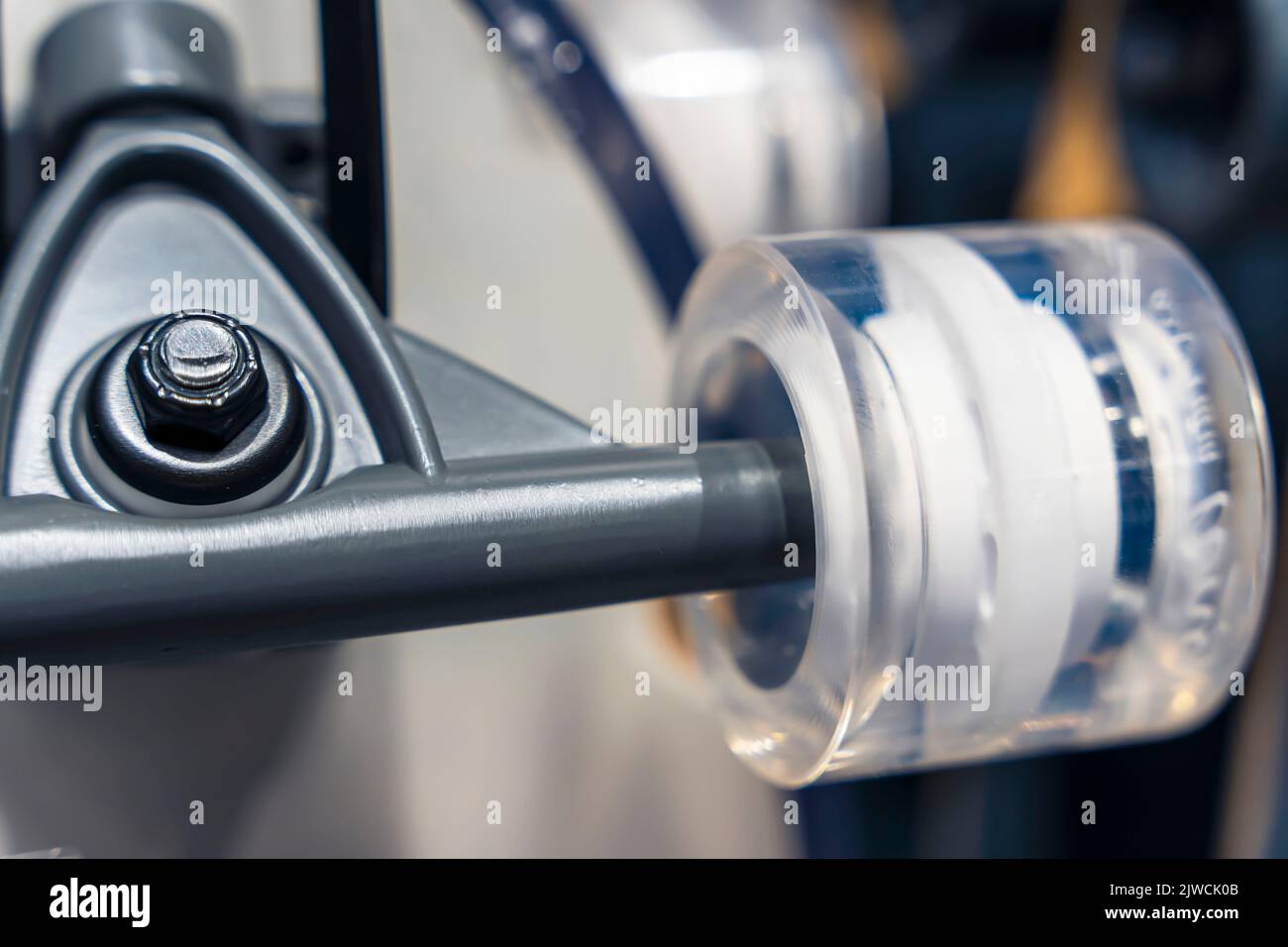 a skateboard wheel. Skateboard, wheels, axle in a sports store Stock