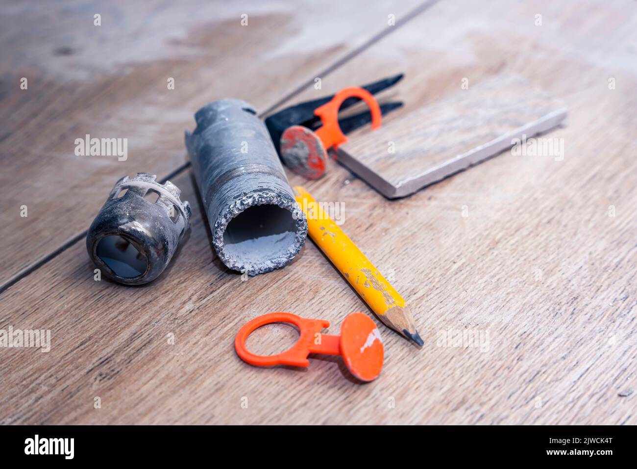 repair tools. diamond crown for drilling hole in ceramic tiles, pencil