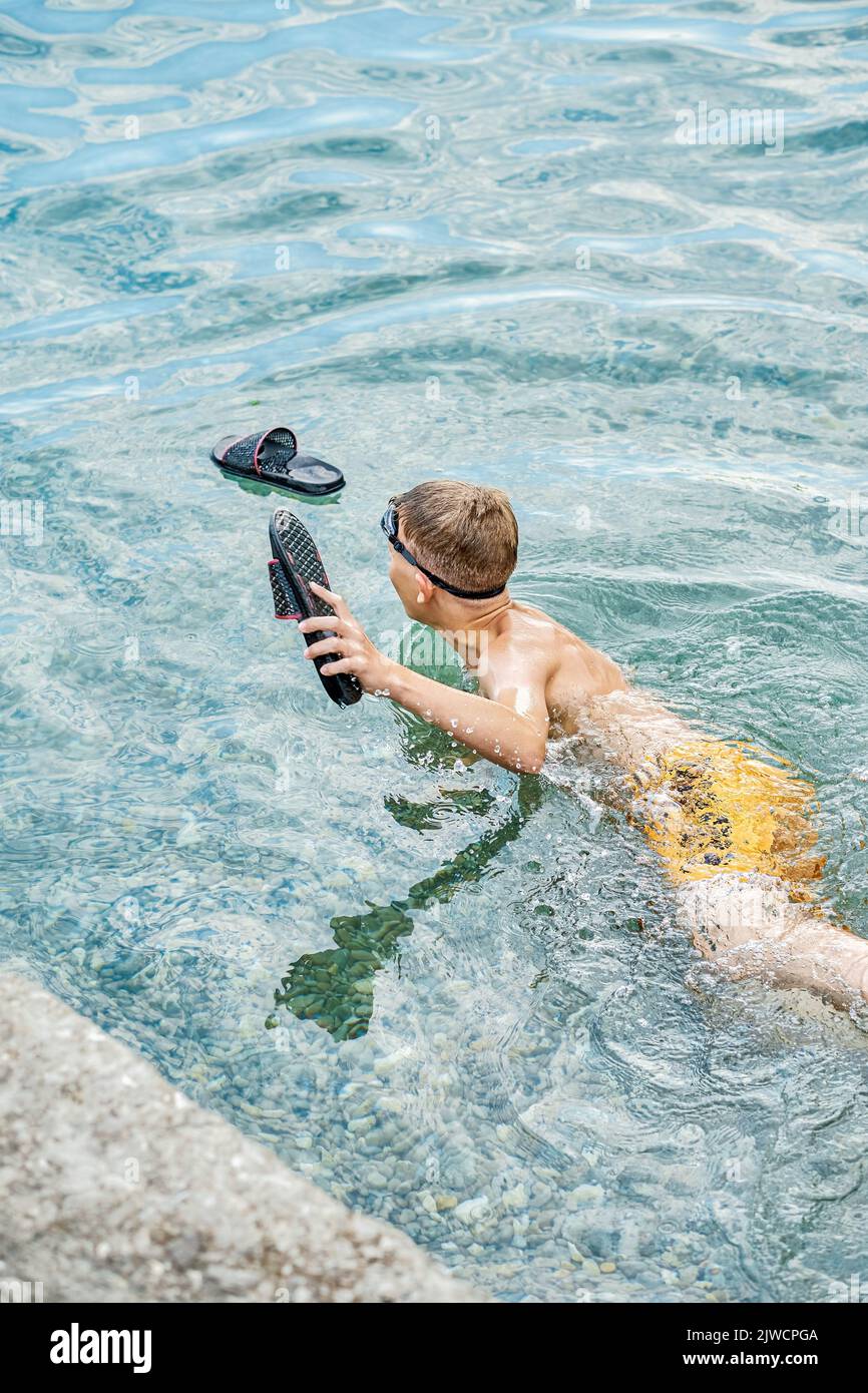 Water sea slipper hi res stock photography and images Alamy
