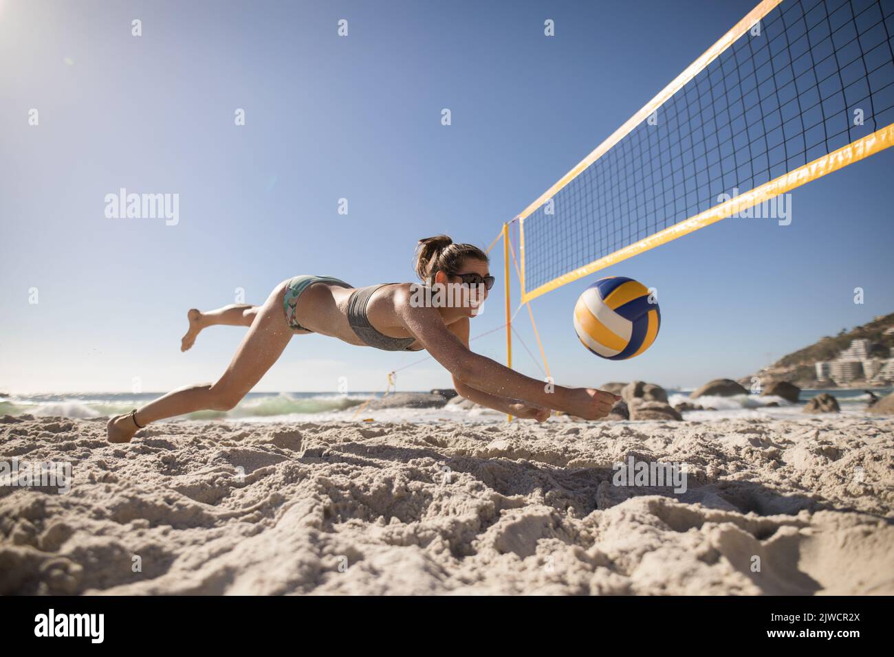 Female volleyball player playing on the beach Stock Photo Alamy