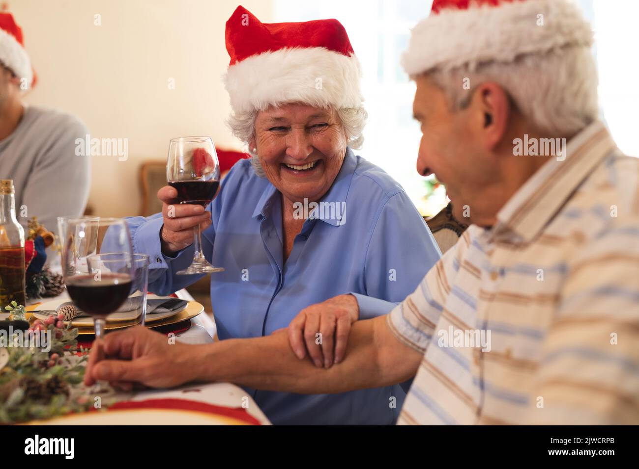 Senior caucasian couple sitting at table for dinner together Stock Photo