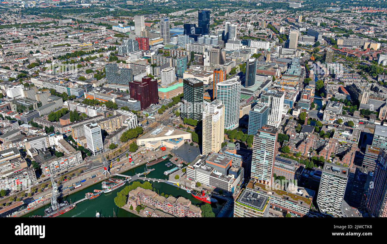 Rotterdam from above in Netherlands ft. new aerial skyline of the city center around business financial district, flying along the skyscrapers Stock Photo