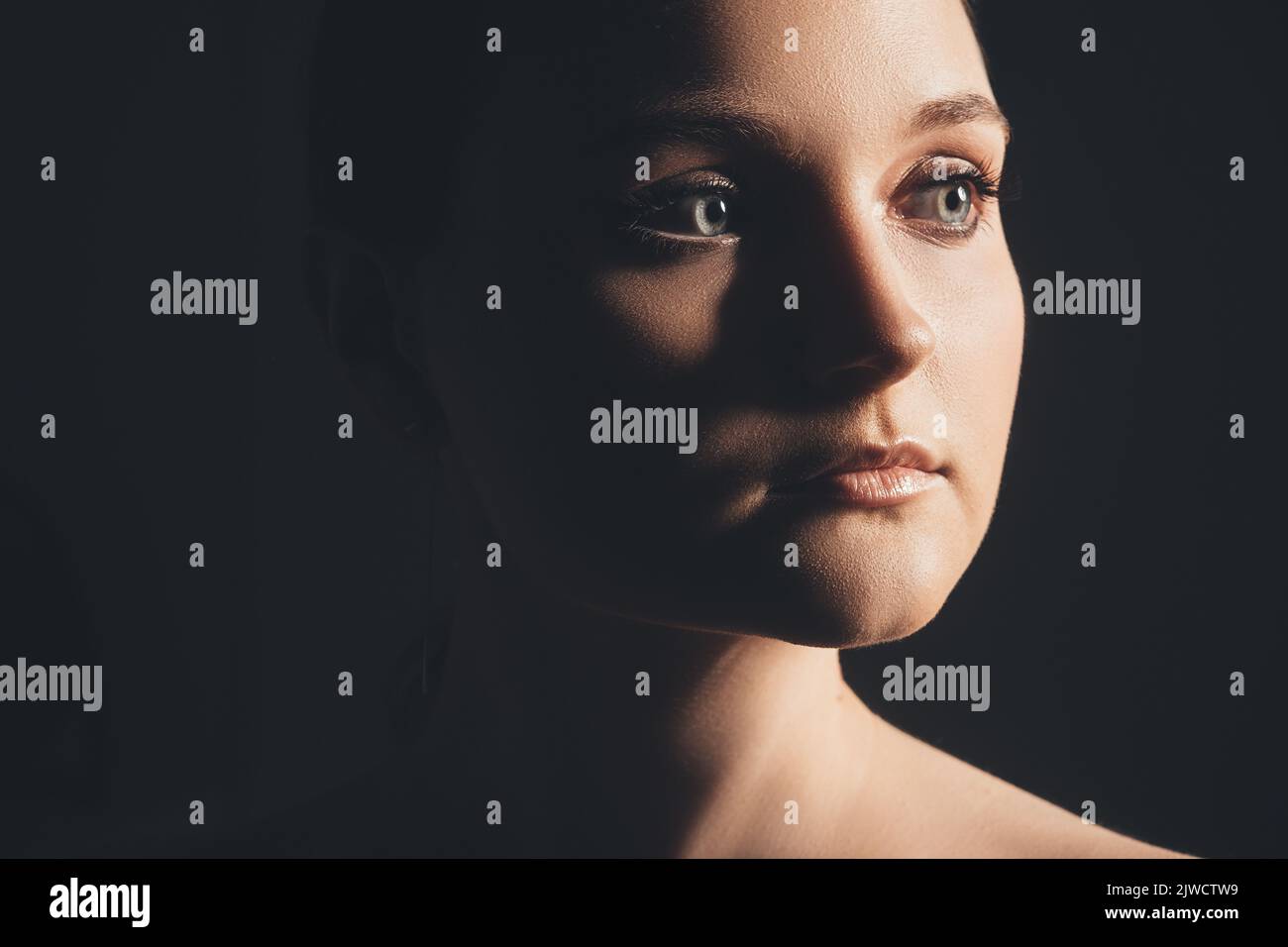female face woman mystery confident lady dark Stock Photo - Alamy