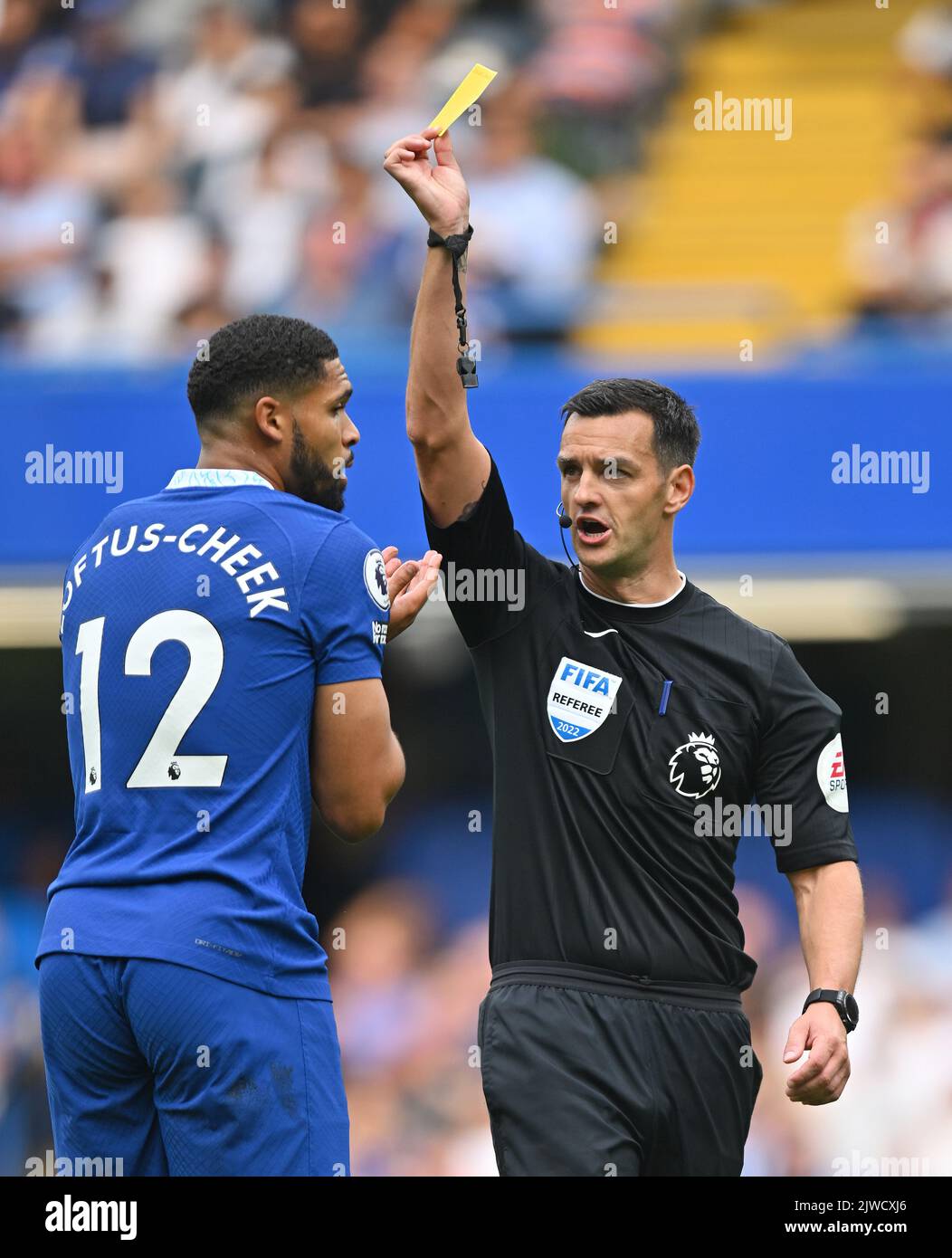 03 Sep 2022 - Chelsea v West Ham United - Premier League - Stamford Bridge  Referee Andy Madley shows the yellow card to Ruben Loftus-Cheek during the match at Stamford Bridge  Picture : Mark Pain / Alamy Live News Stock Photo