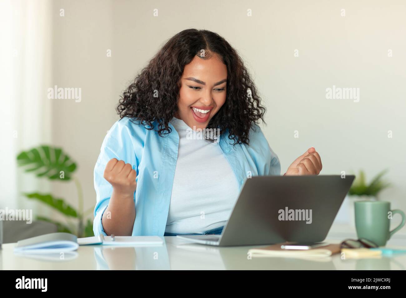 Joyful office celebration woman hi-res stock photography and images - Alamy