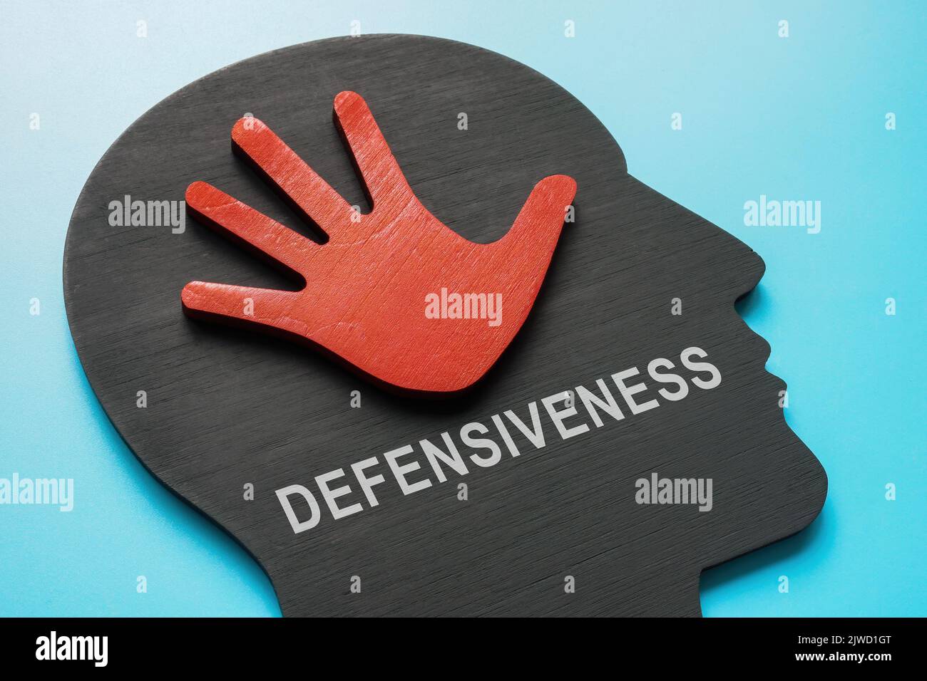 Head with palm hand and sign Defensiveness. Stock Photo