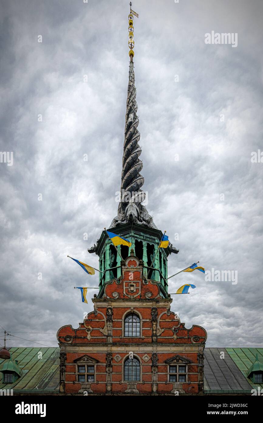 COPENHAGEN, DENMARK - SEPTEMBER 03, 2022: A view of the old stock exchange building's ornate spire. Stock Photo