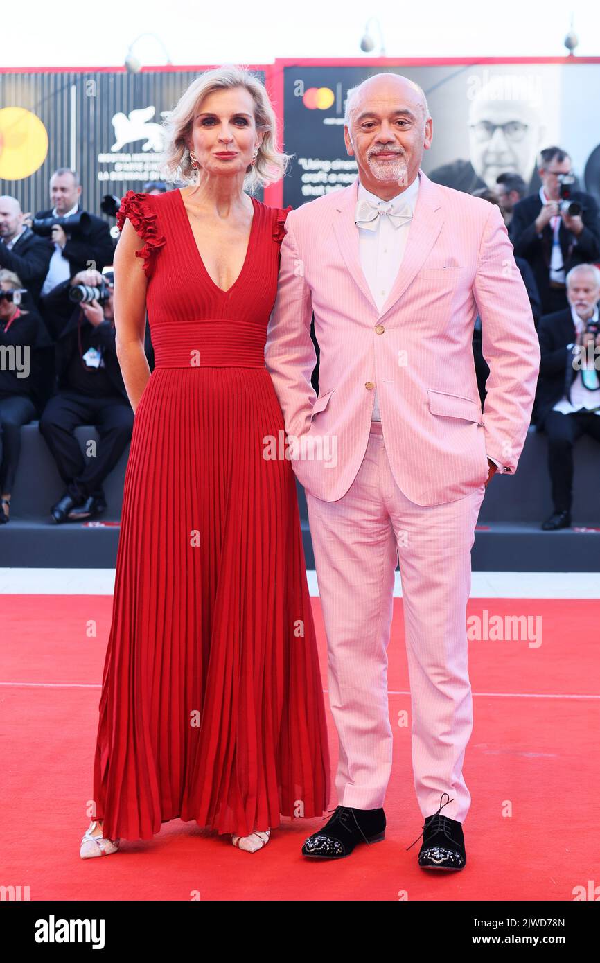 VENICE, ITALY - SEPTEMBER 02: Mélita Toscan du Plantier and Christian Louboutin attend 'Bones and all' Red Carpet during 72nd Venice Film Festival at Stock Photo