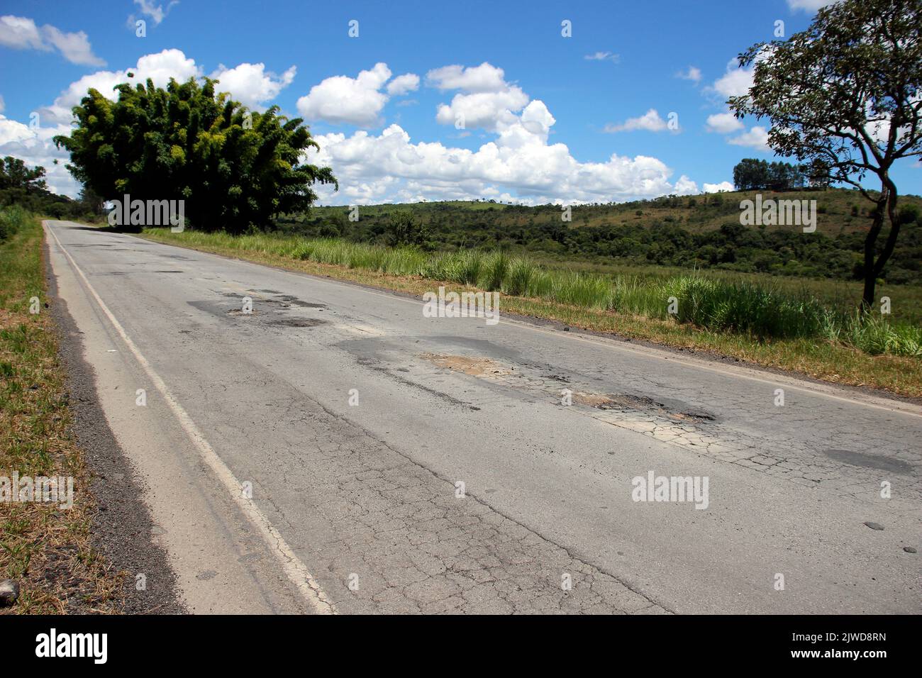 highway roof with defective and spoiled asphalt, dangerous for traffic Stock Photo