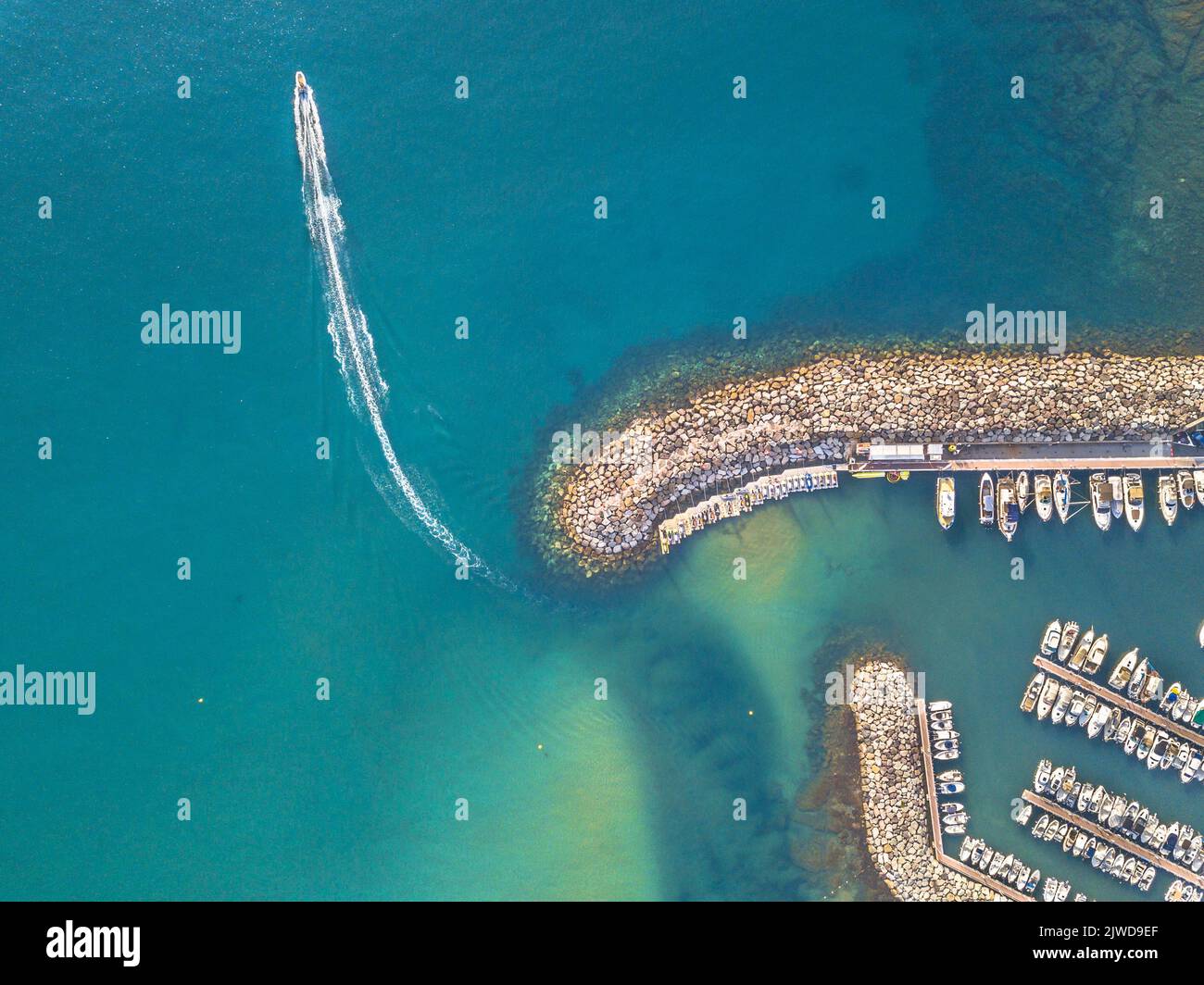 Marina top down aerial view with boat sailng off in mediterranean Sea in Saint Aygulf near Frejus Cote d'Azur, France Stock Photo