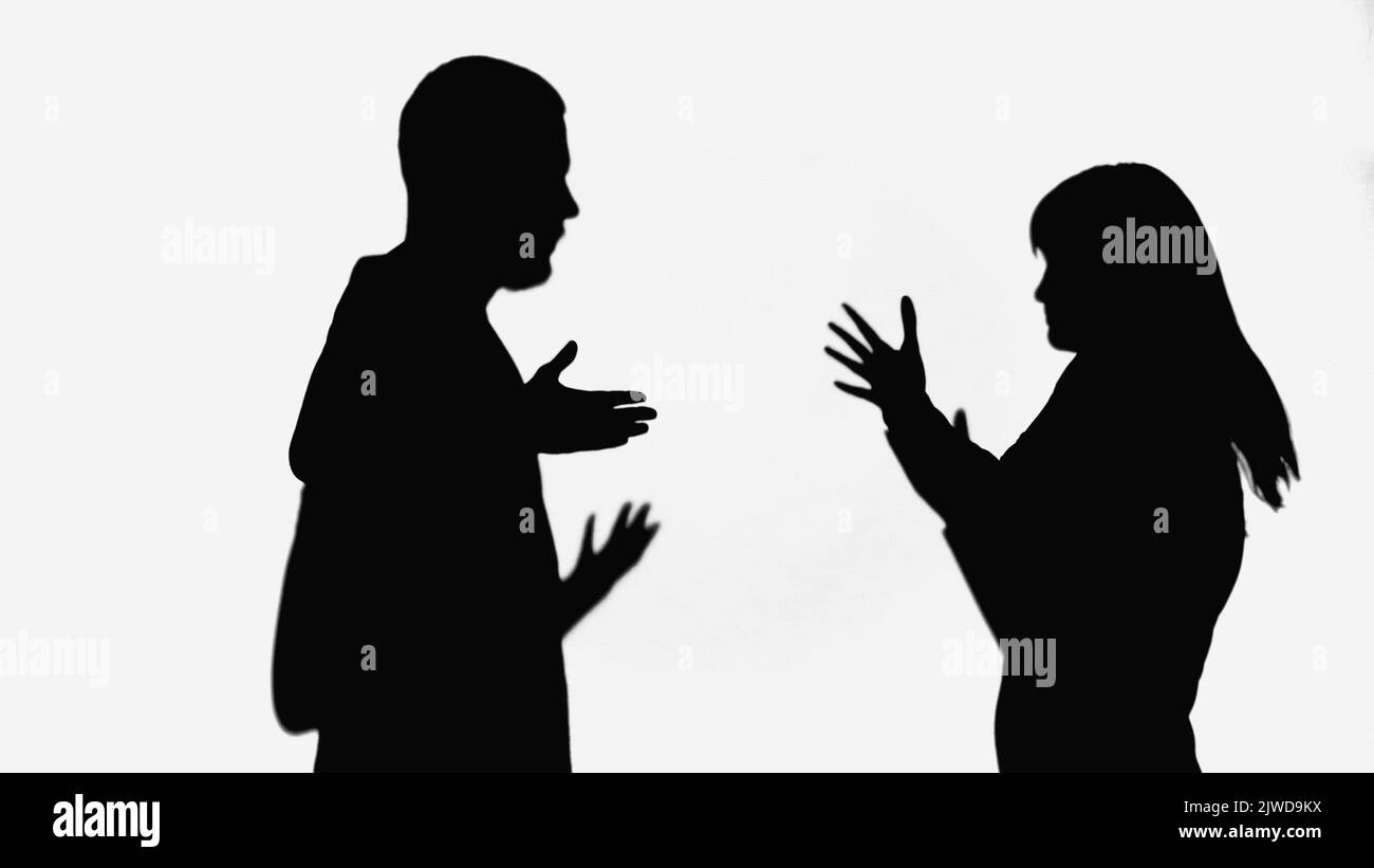 silhouettes of man and woman quarreling and gesturing isolated on white ...