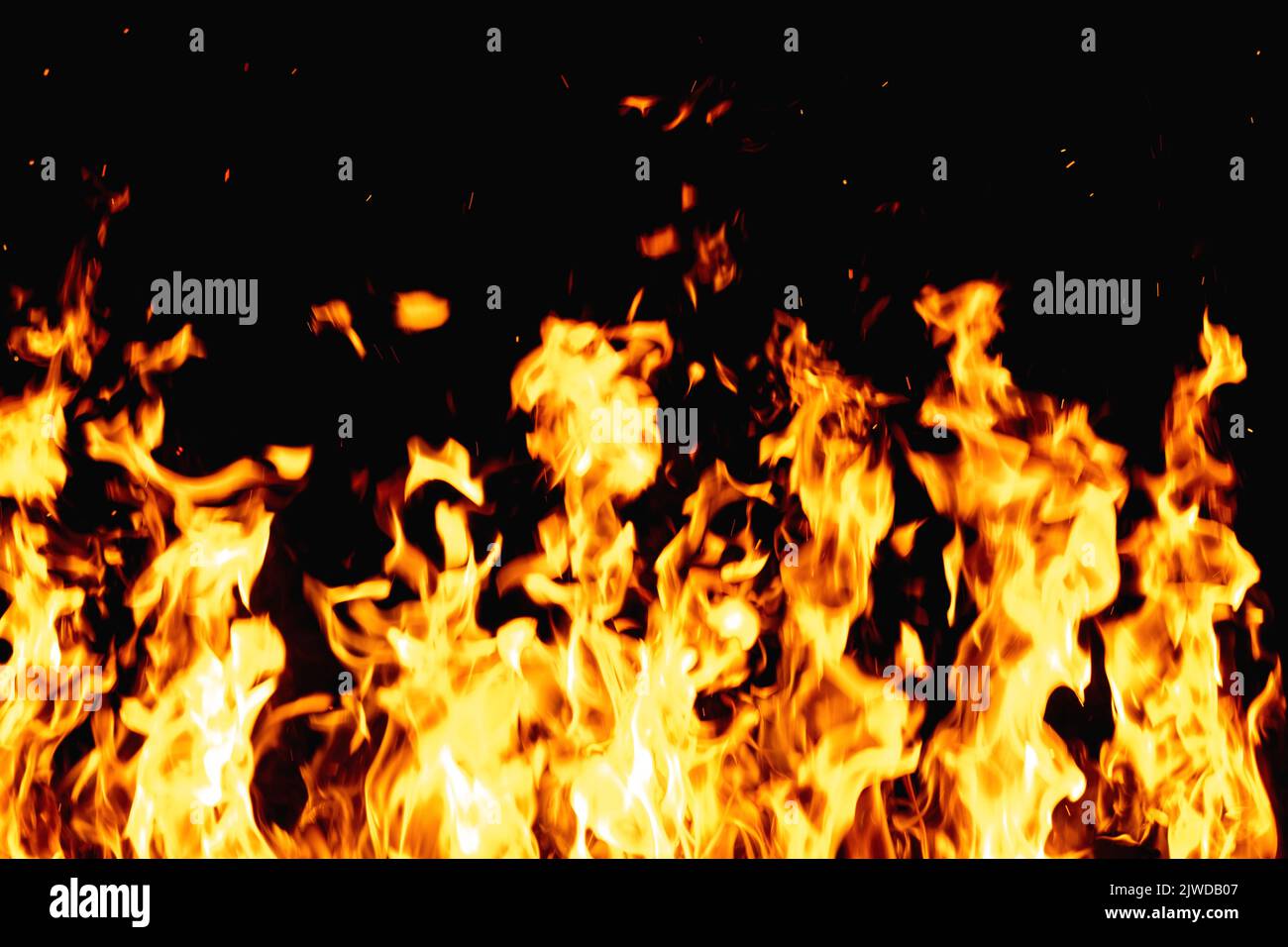 fire on black flame texture hot blaze orange spark Stock Photo