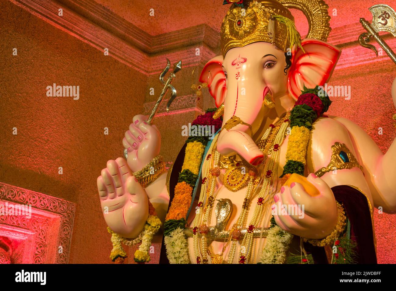 A beautiful idol of Lord Ganesha being worshipped at a mandal in Mumbai ...