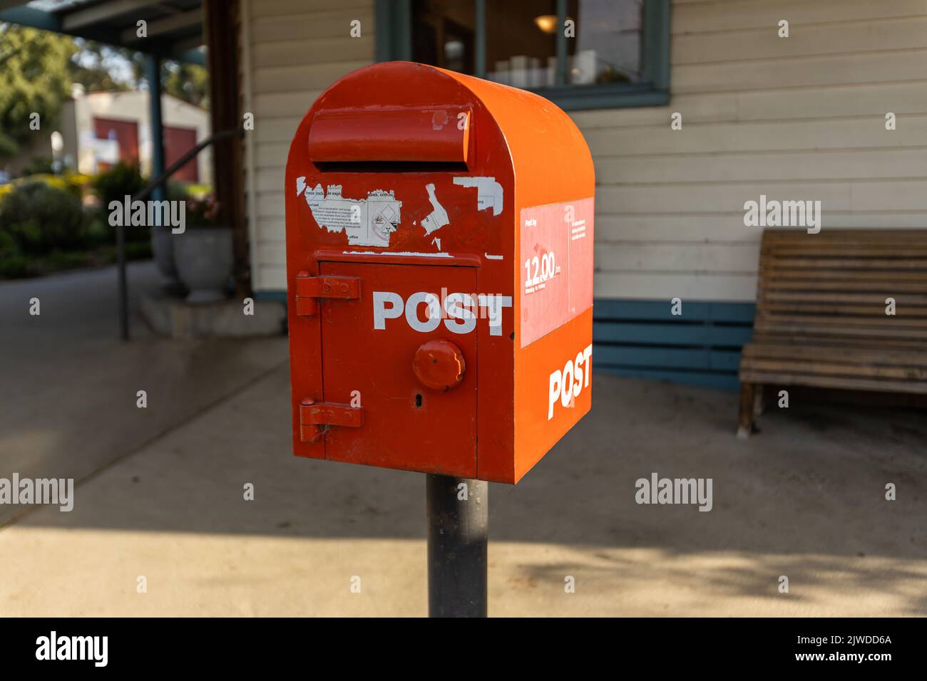 A red australia post letter box stripped of all branding and logos Stock Photo Alamy
