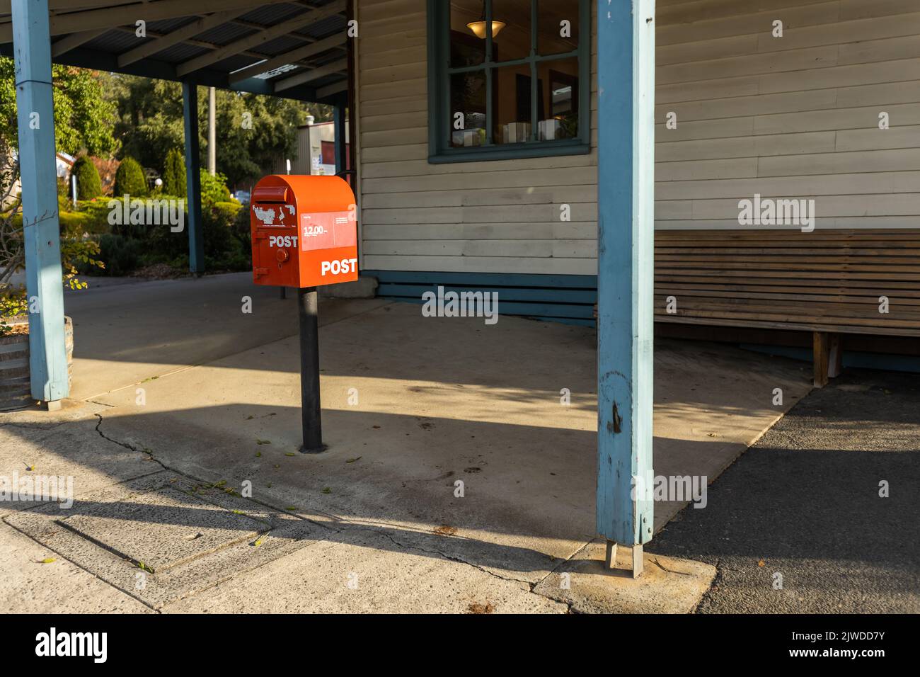 A red australia post letter box stripped of all branding and logos. Stock Photo