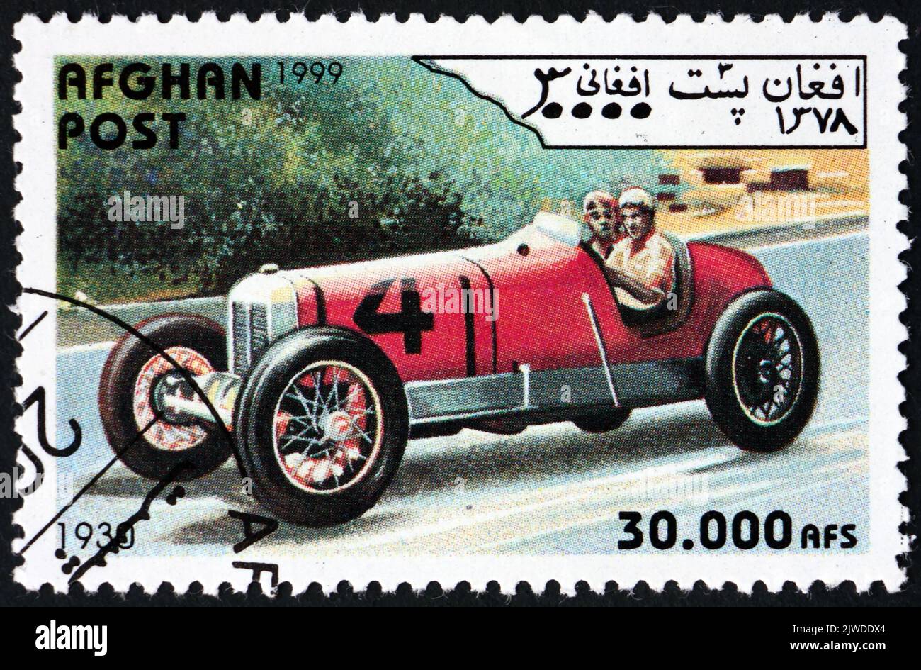 AFGHANISTAN - CIRCA 1999: a stamp printed in Afghanistan shows vintage racing car from 1930, circa 1999 Stock Photo