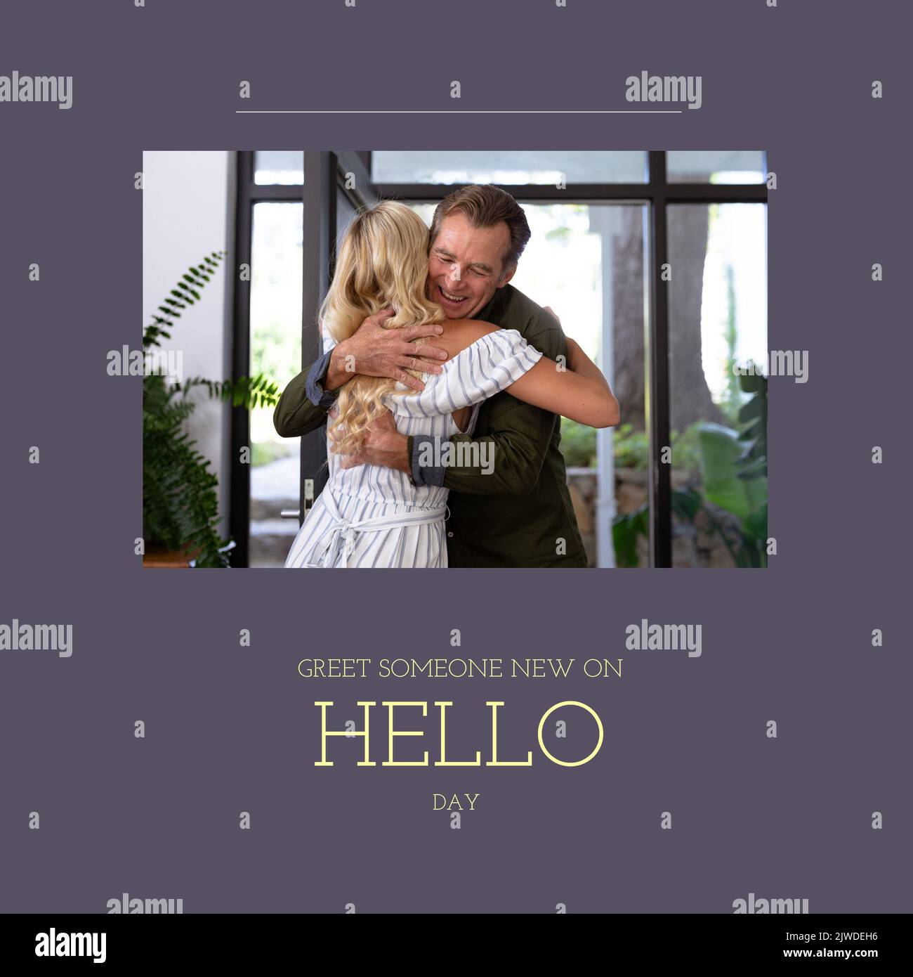 Composition of greet someone new on hello day text with caucasian couple embracing Stock Photo