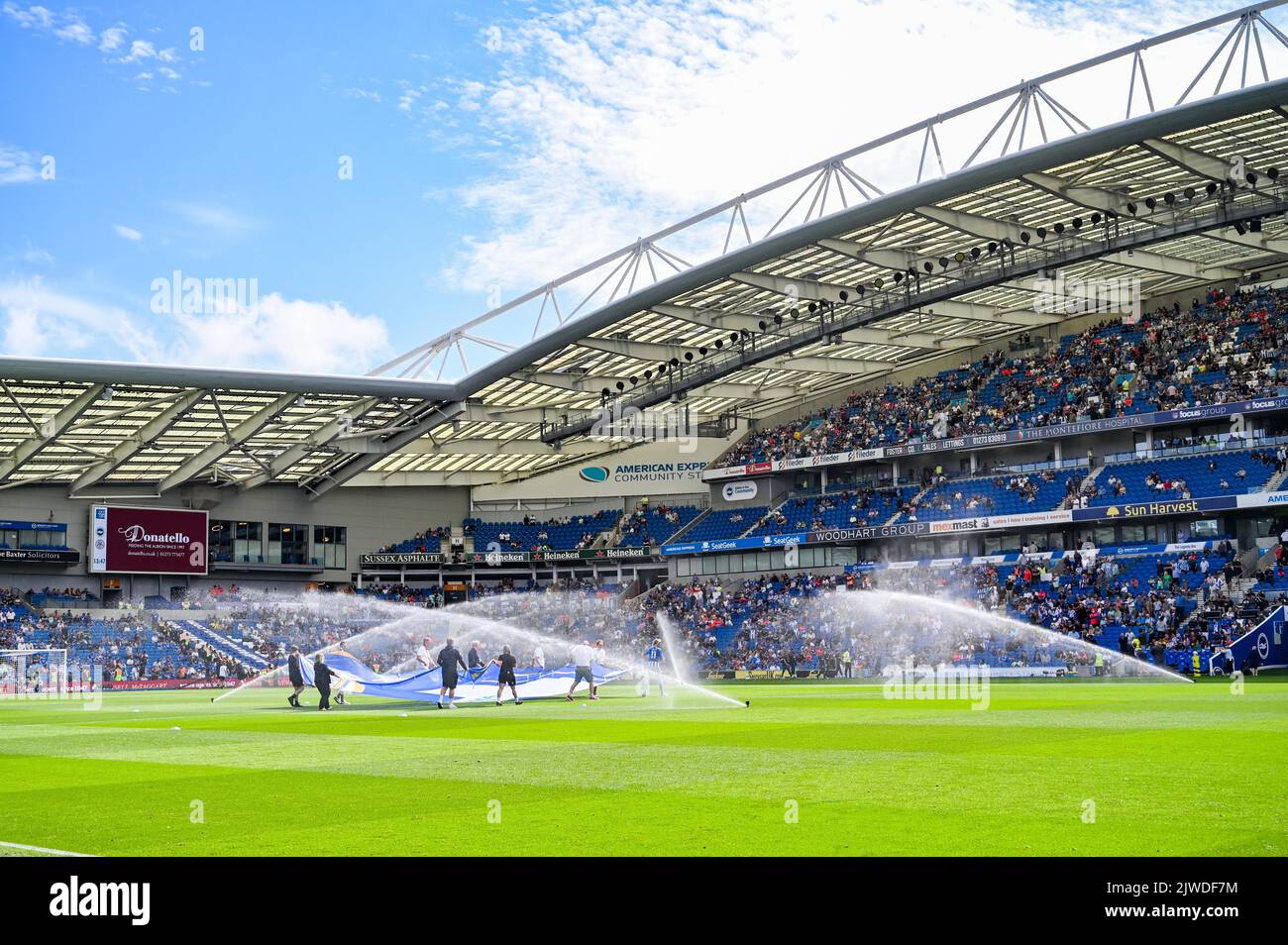 Watering  the pitch before the Premier League match between Brighton and Hove Albion and Leicester City at the American Express Stadium  , Brighton , UK - 4th September 2022 Editorial use only. No merchandising. For Football images FA and Premier League restrictions apply inc. no internet/mobile usage without FAPL license - for details contact Football Dataco Stock Photo