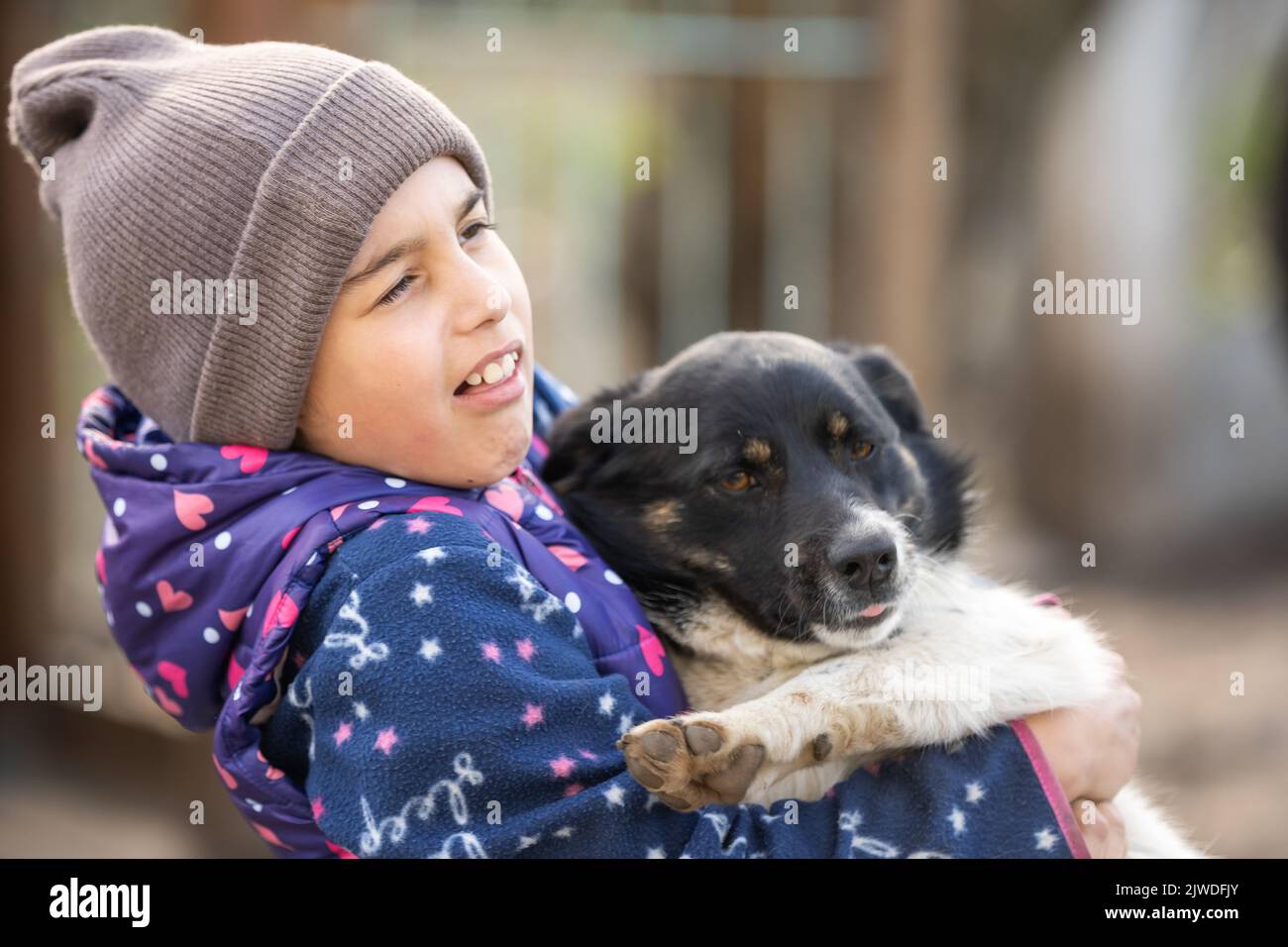 Little latin girl with her big dog in the countryside Stock Photo - Alamy