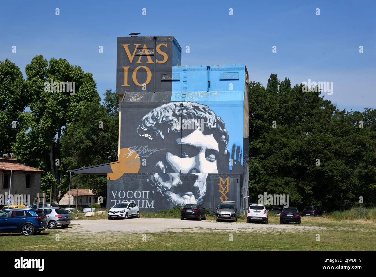Painted Silo on Classical Roman Art Theme or Roman Sculpture at entrance to Vaison-la-Romaine Vaucluse Provence France Stock Photo