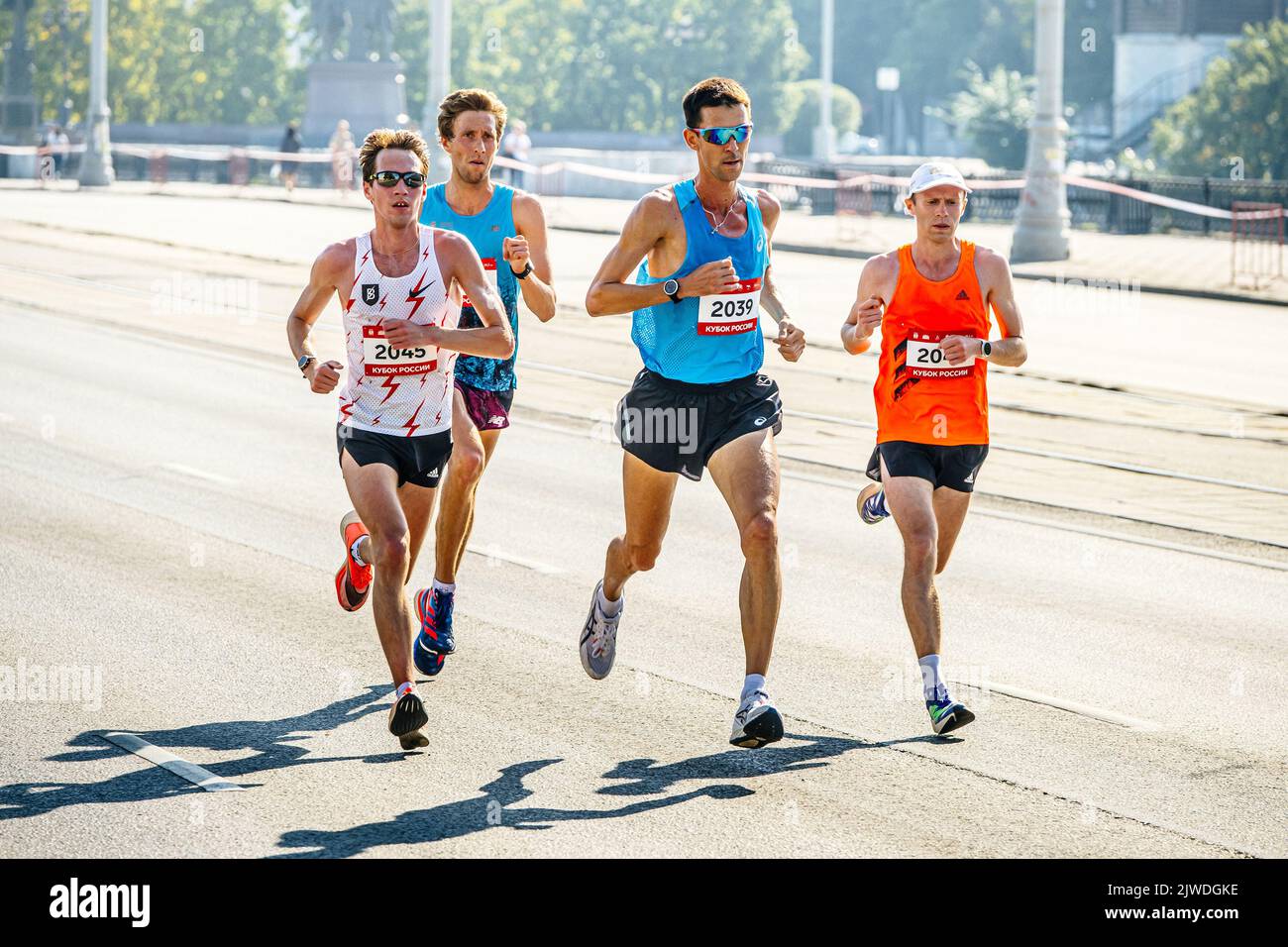 Ekaterinburg, Russia - August 7, 2022: leading group runners athletes at 21 km in Europe-Asia Marathon Stock Photo