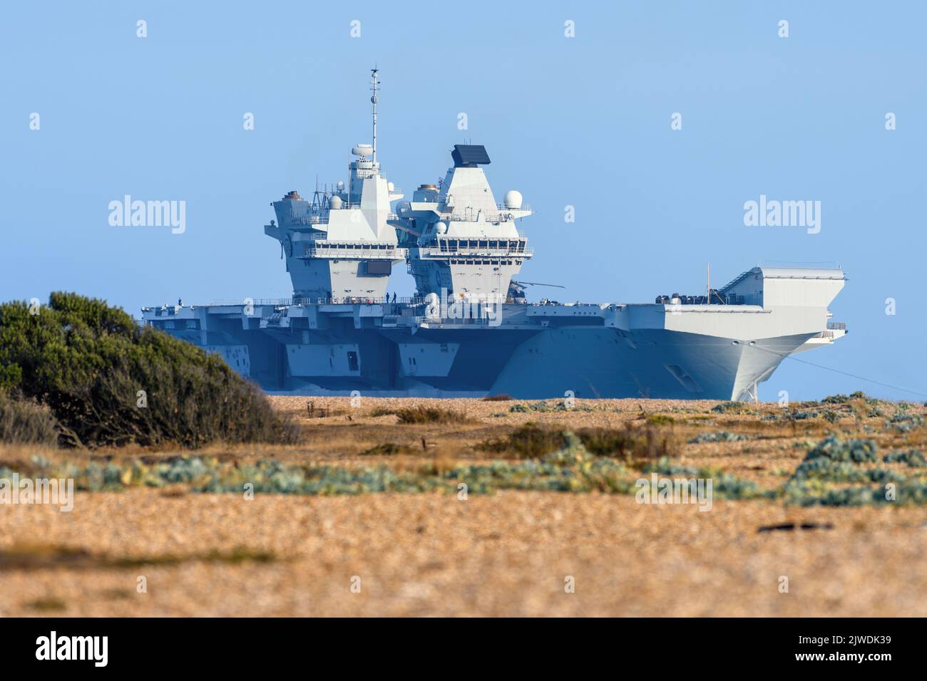 The Royal Navy Queen Elizabeth class aircraft carrier HMS Prince of Wales (R09) approaching the Solent anchorages. Stock Photo
