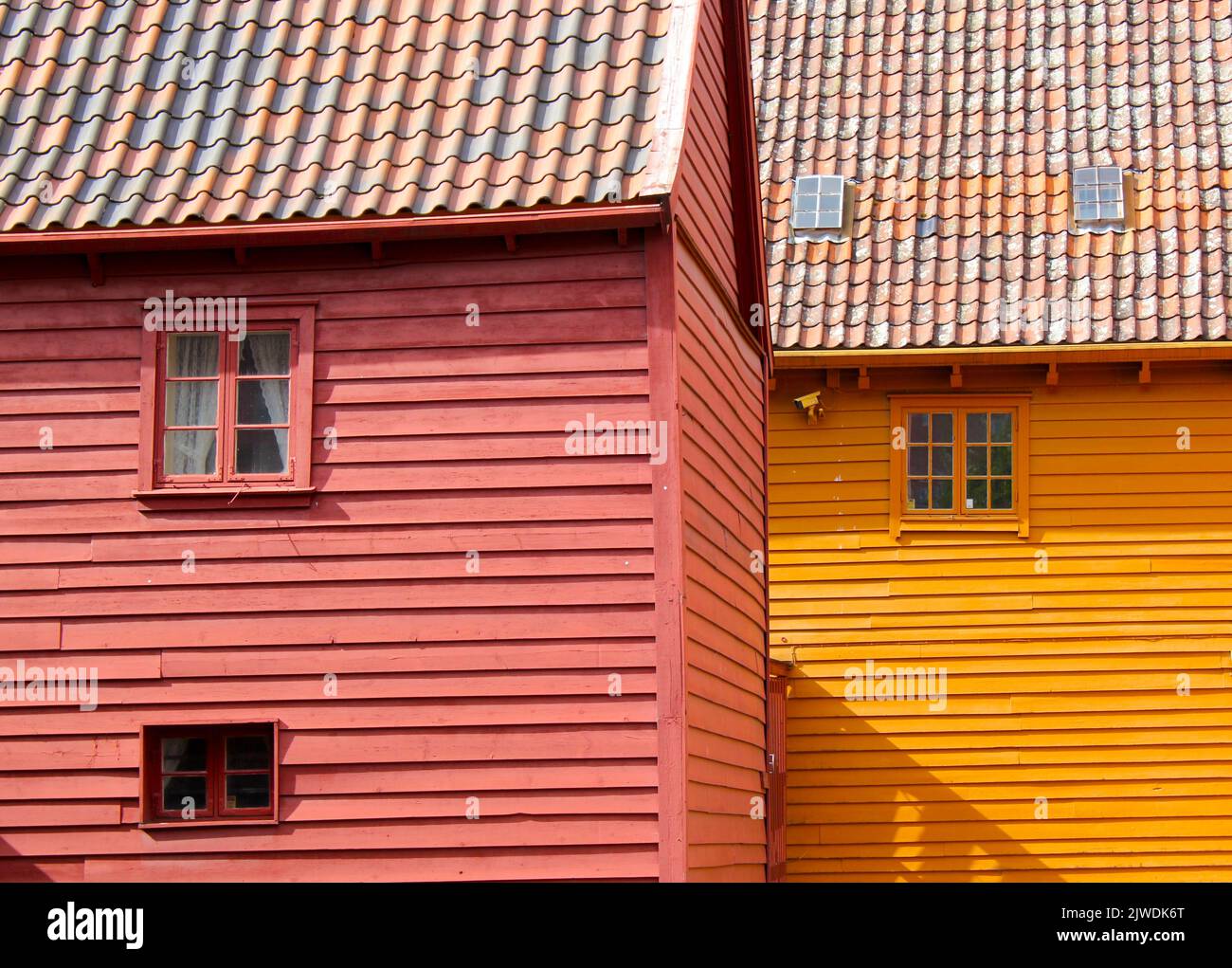 Typical wooden facades and tiled roofs of the buildings in Bruggen in Bergen Stock Photo