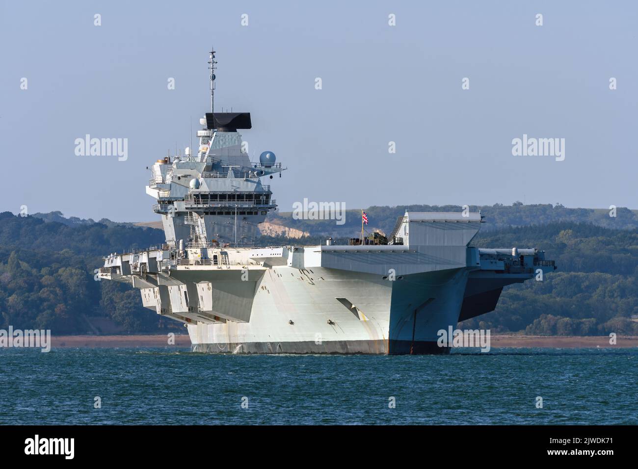 The Royal Navy Queen Elizabeth class aircraft carrier HMS Prince of Wales (R09) at anchor in the Solent. Stock Photo