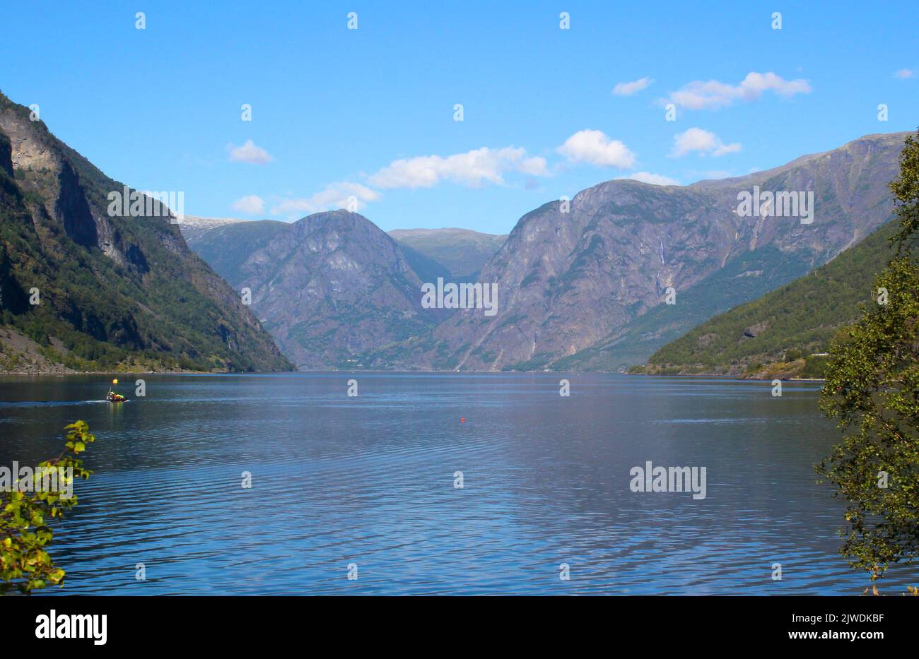 Views across the water in Aurlandsfjord from paths near Flam in Norway Stock Photo